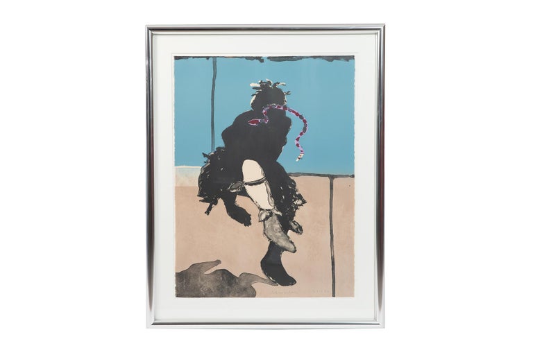 Dynamic Fritz Scholder signed lithograph depicting the silhouette of a Native American dancer with a snake between his teeth. 
Dimensions listed are inclusive of the frame. Print itself measures: 22