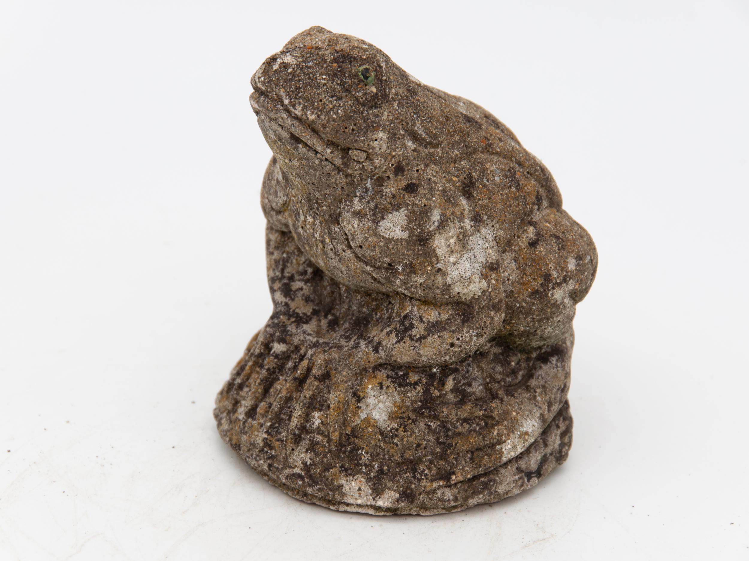This petite garden ornament has a charming frog perched upon a little rock. According to his patina, he appears to have provided comedic relief in an English garden for a quite a few years before making its way into our hands.