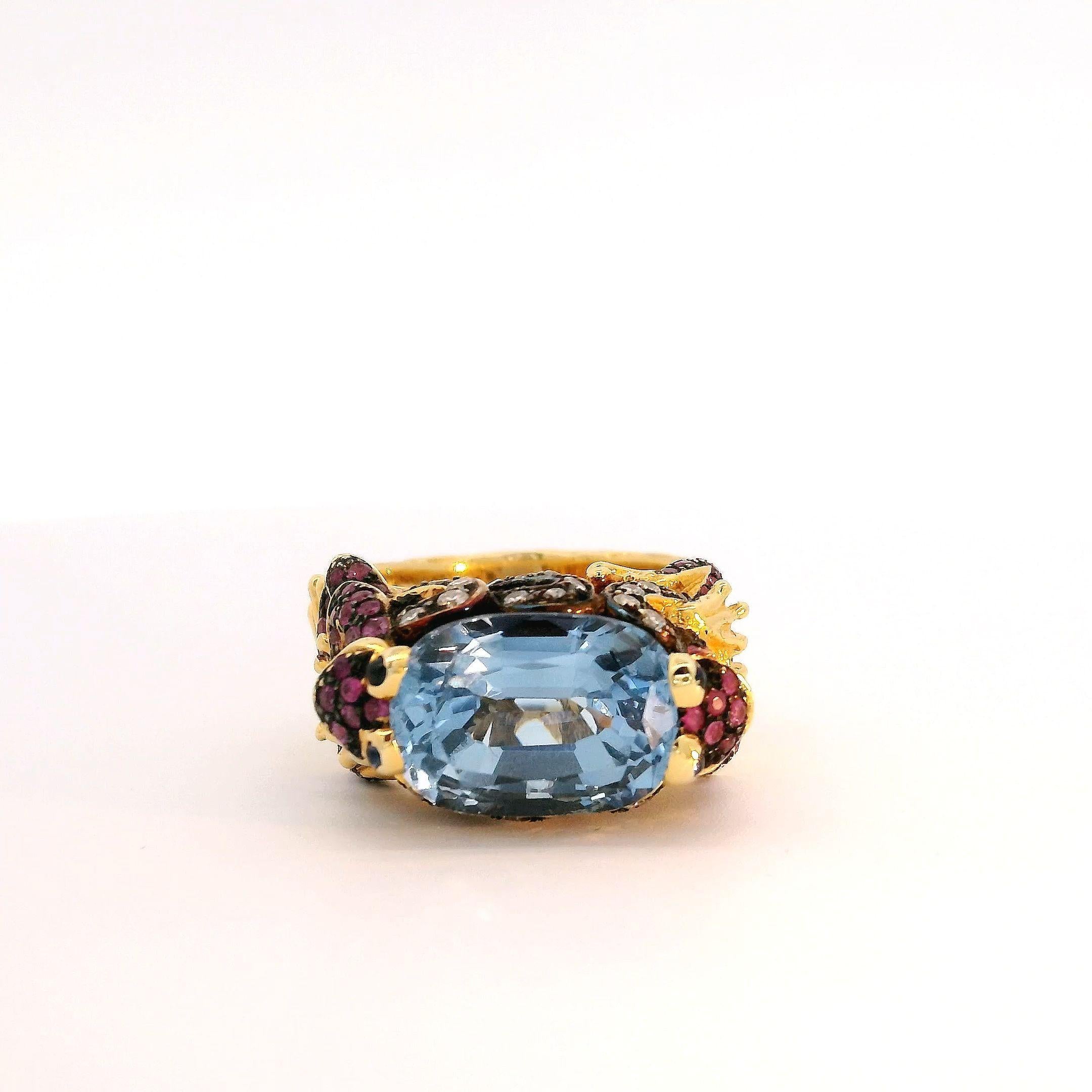 Behold the enchanting beauty of our exquisite statement ring! This luxurious piece is a true masterpiece, meticulously crafted to captivate and mesmerize. At its heart lies a magnificent blue topaz, radiating with an alluring brilliance that will