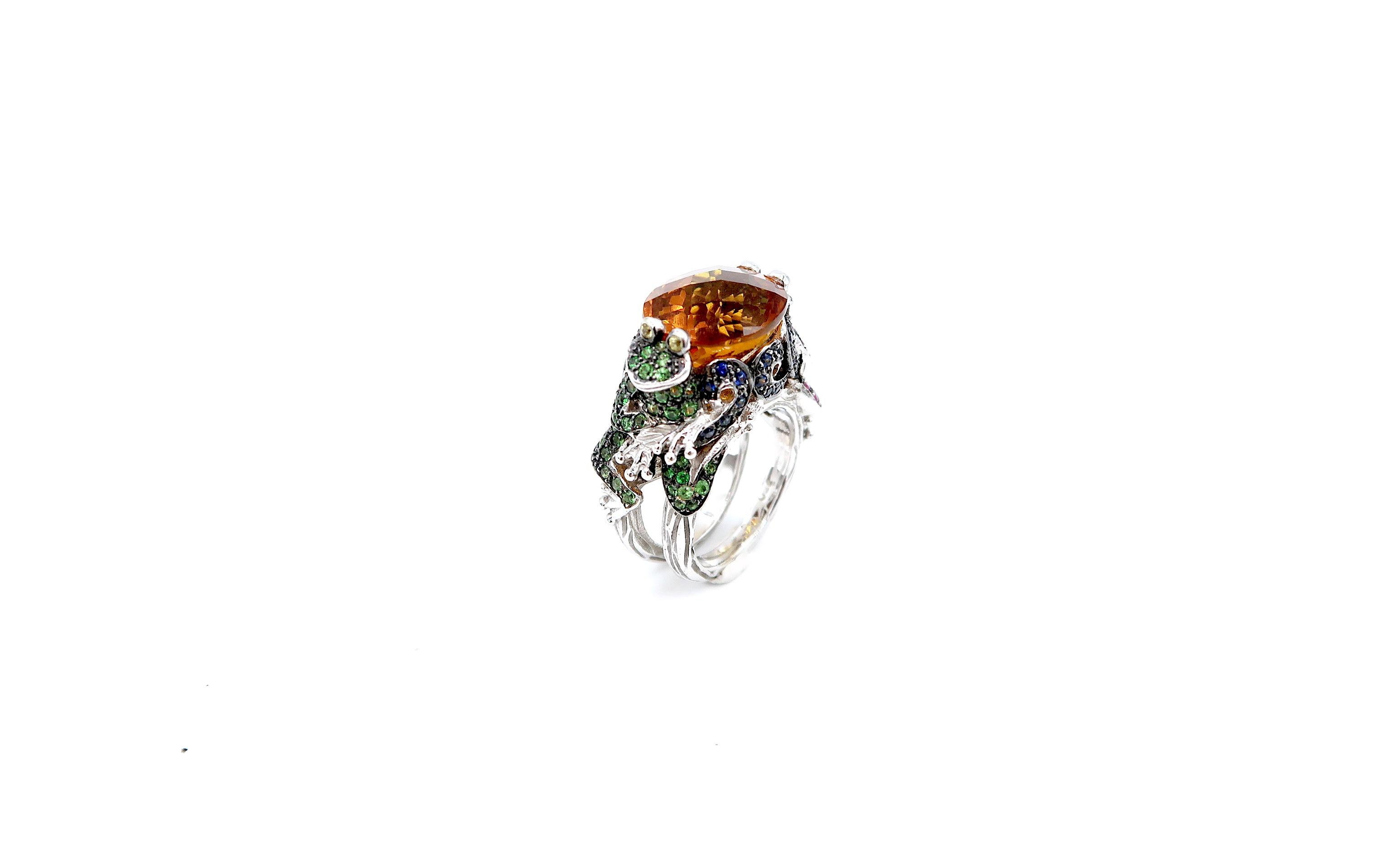 Frog Prince 9.25 Carat Citrine embellished with Blue Sapphire, Pink Sapphire, and  Tsavorite Cocktail Ring in 18 Karat White Gold 

Complimentary resizing service for this ring is available. Please kindly let us know upon check-out.

Size : 52, US
