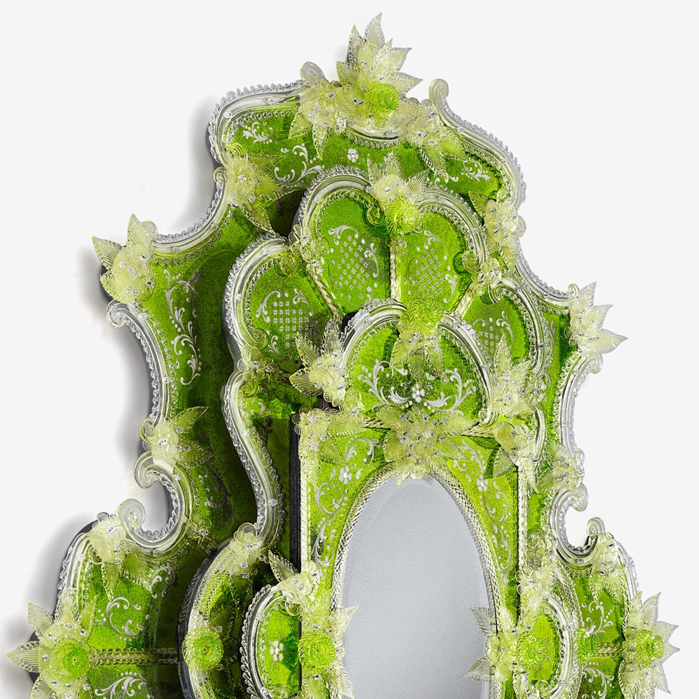 From the Fairy Tales Collection, inspired by the world of fairy tales revisited in a Baroque style by Leo De Carlo. The multiple Frog Prince mirror is made of three levels, Venetian engraved glass with acid green varnished and medium antiqued