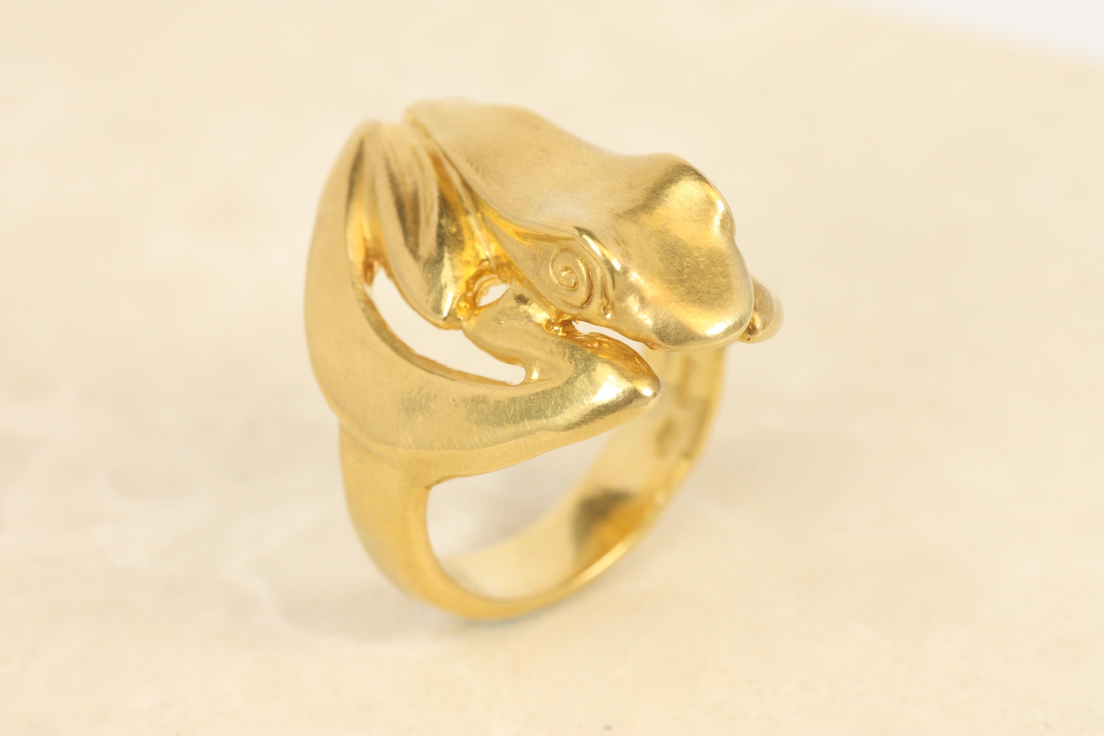 This ancient-inspired frog ring is a wearable work of art. Crafted in solid 22K yellow gold, the frog design wraps beautifully and comfortably around the finger. Inspired by pre-Columbian motifs, this ring connects the wearer to timeless artistry