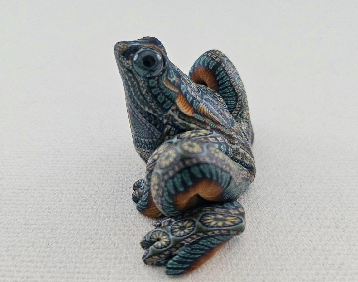 Frog Sculpture by Jon Stuart Anderson, signed and dated.
This amazing miniature sculpture is by the renowned fimo sculptor Jon Stuart Anderson. It was owned by one person who had kept it stored since purchase in 2002 so it is in very nice vintage
