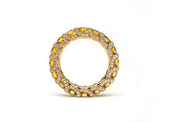 Frohmann Eternity 18 Carat Rose Gold and Fancy Intense Yellow Diamond Ring