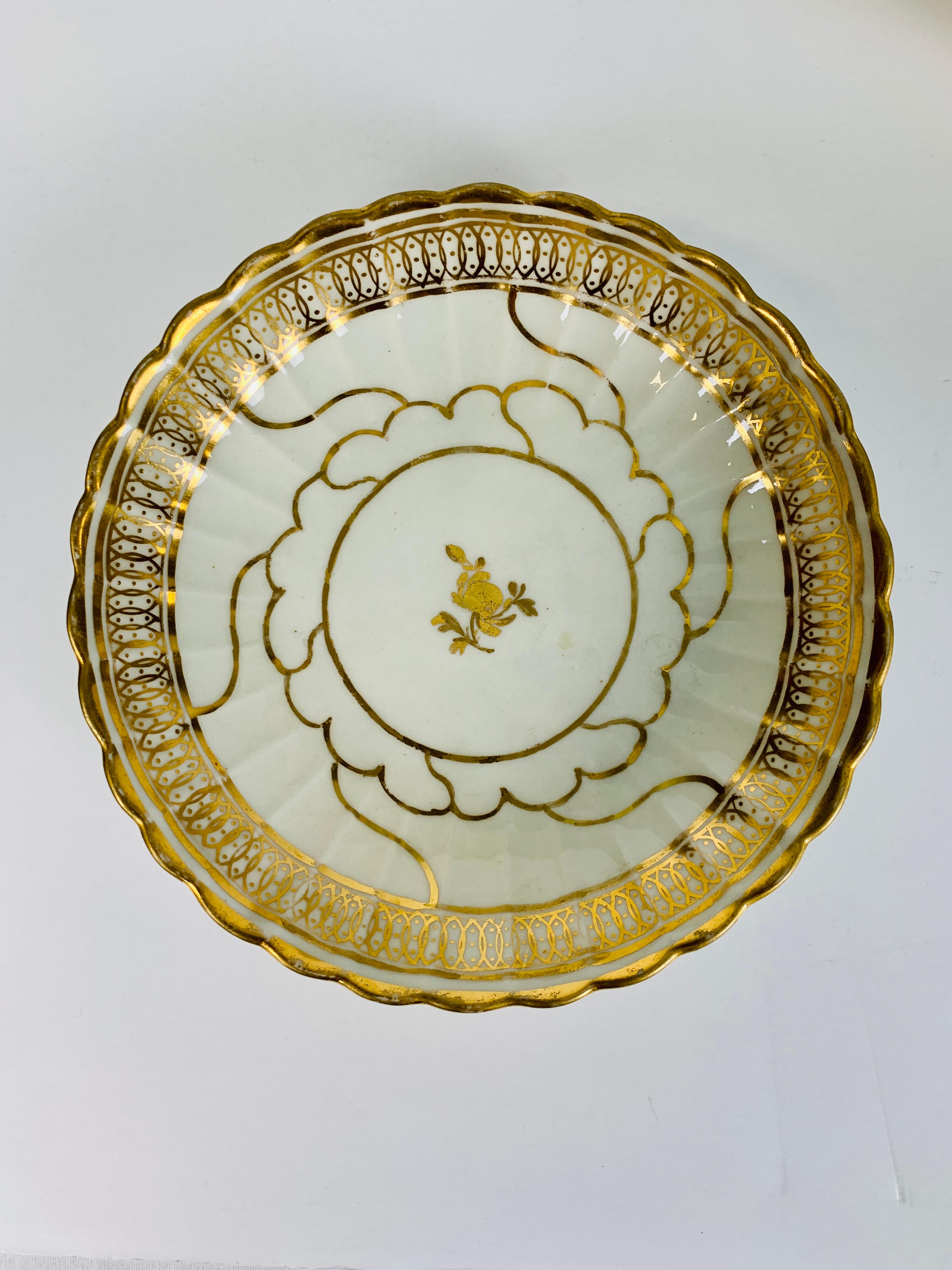Provenance: The Private Collection of Mario Buatta
A group of five elegant Worcester white and gold saucers made in the Regency style in England circa 1810.
The white porcelain makes the lustrous Regency period gold stand out.
Each piece has
