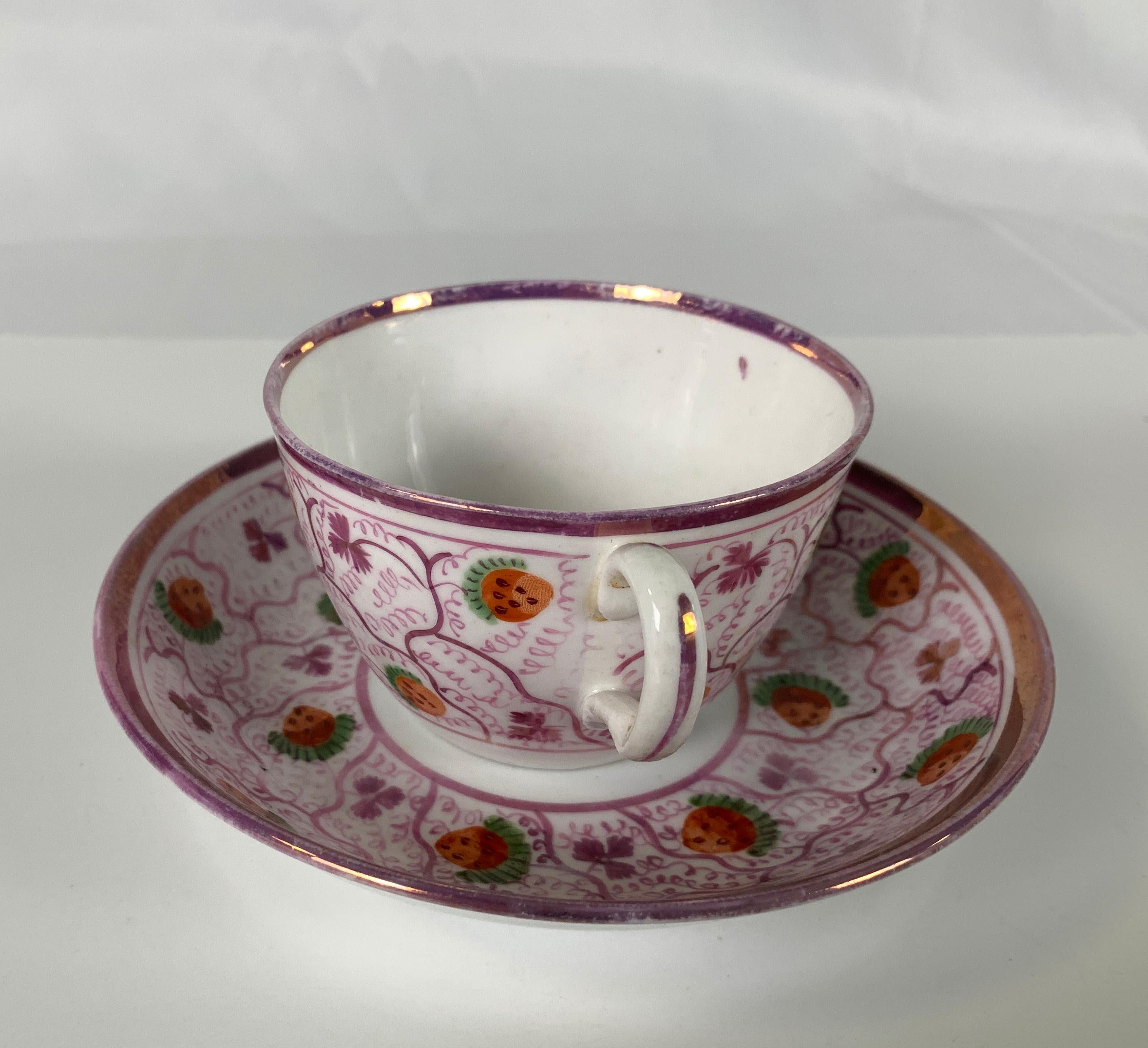 Earthenware From the Collection of Mario Buatta a Pair of Pink Lustre Cups and Saucers