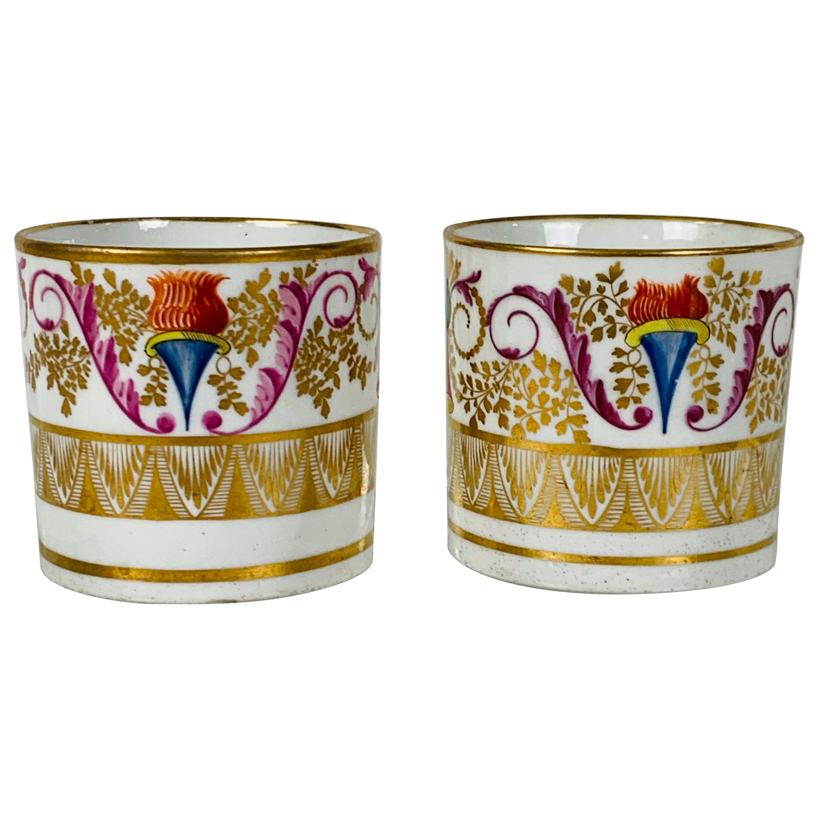 From the Collection of Mario Buatta a Pair of Regency Period Coffee Cups