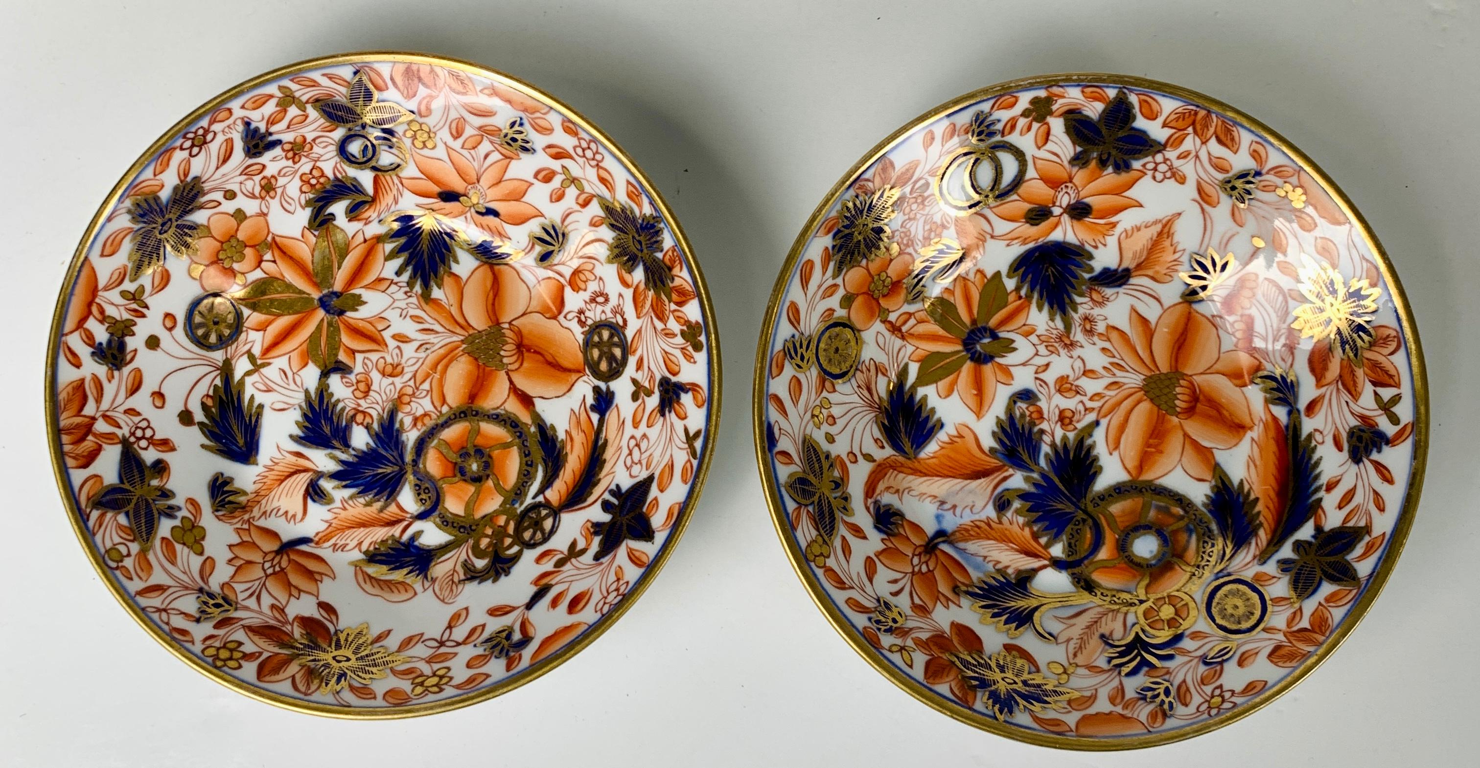 Provenance: The Private Collection of Mario Buatta 
Mario loved beautiful combinations of colors. This pair of English Tobacco Leaf pattern saucers have exquisite Imari colors. The saucers have a vivid palette of orange-red, cobalt blue, and gold.