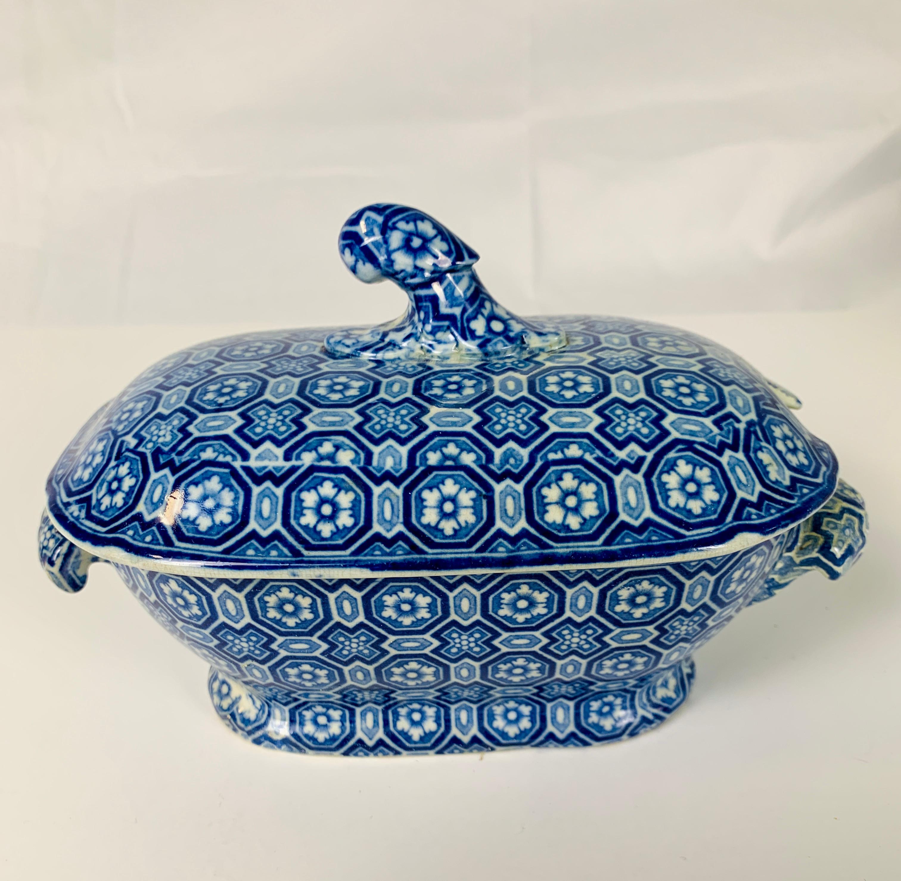 Provenance: The Private Collection of Mario Buatta a blue and white small tureen and ladle made by Davenport circa 1820.
The underside with the paper shipping label to 