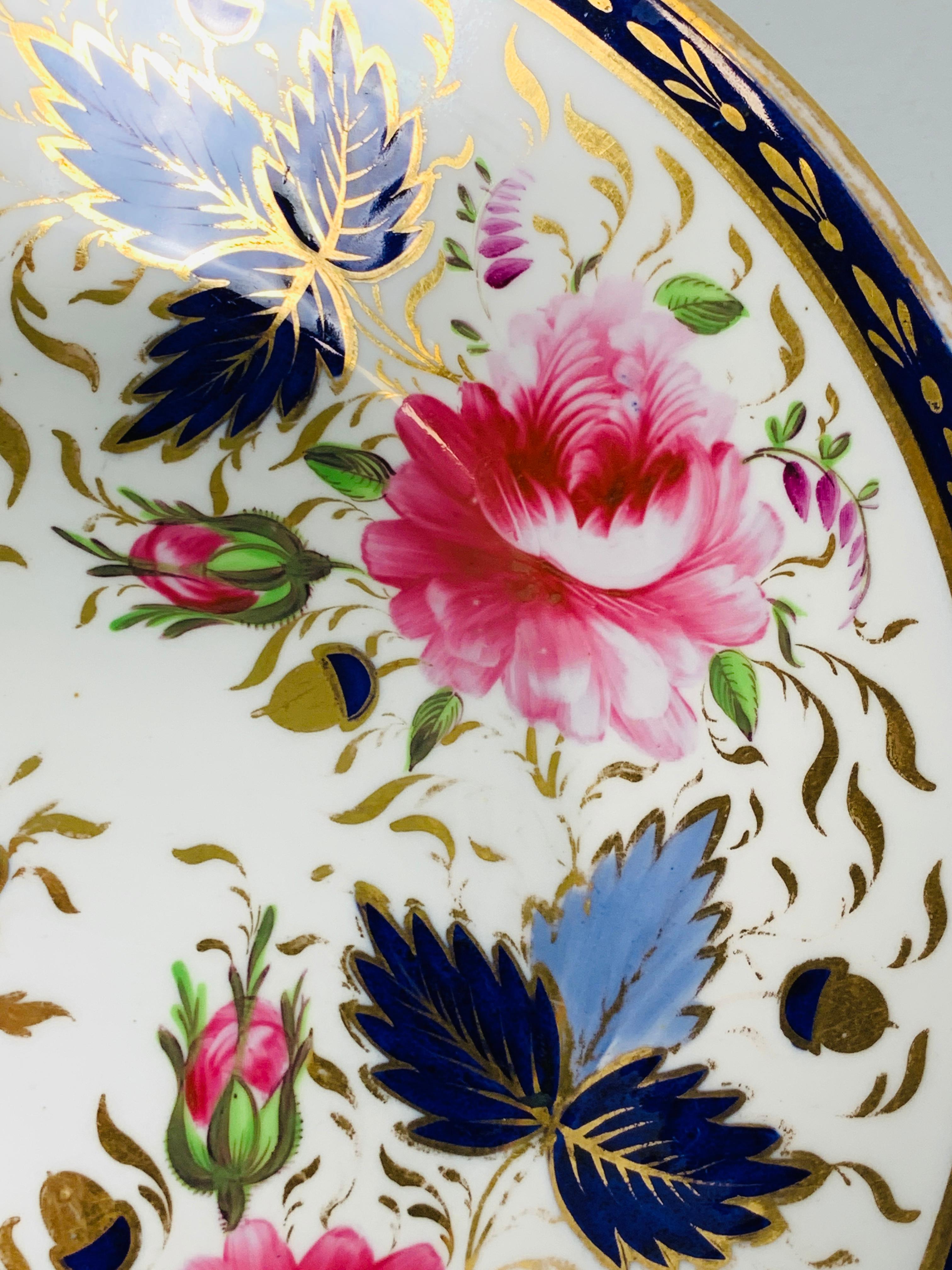 Provenance: The Private Collection of Mario Buatta
A Staffordshire Saucer dish made in England, circa 1830.
Mario loved flowers, and he loved well-painted flowers on porcelain.
This saucer dish is hand painted with delightful pink peonies