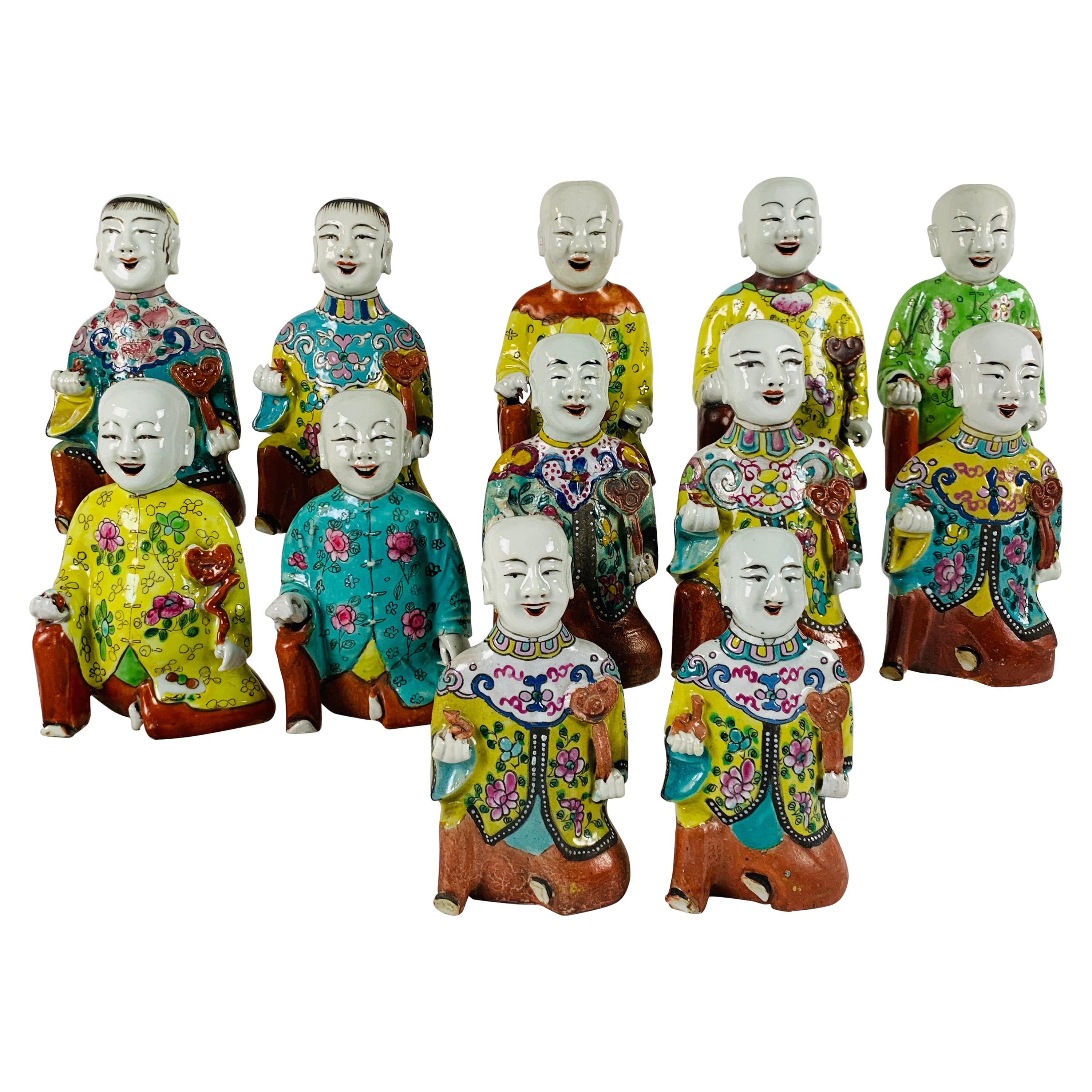 From the Collection of Mario Buatta Set of 12 Chinese "Laughing Boys" circa 1800