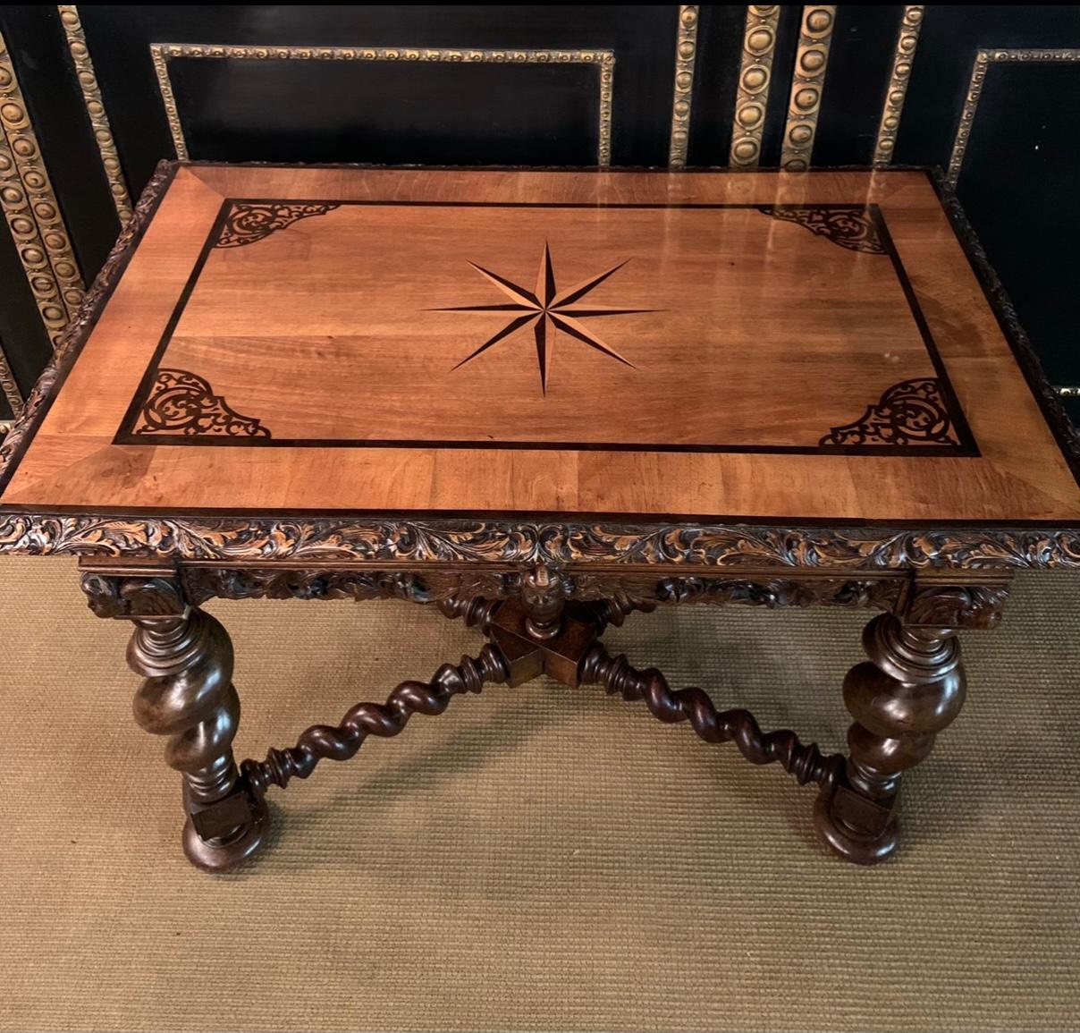 We offer a unique Neo Renaissance / Gdansk Baroque table.

The table stood in the entrance of a magnificent villa in the posh district of Grunewald for over 70 years.
Here are the original black and white photos of the table.

Solid oak with relief