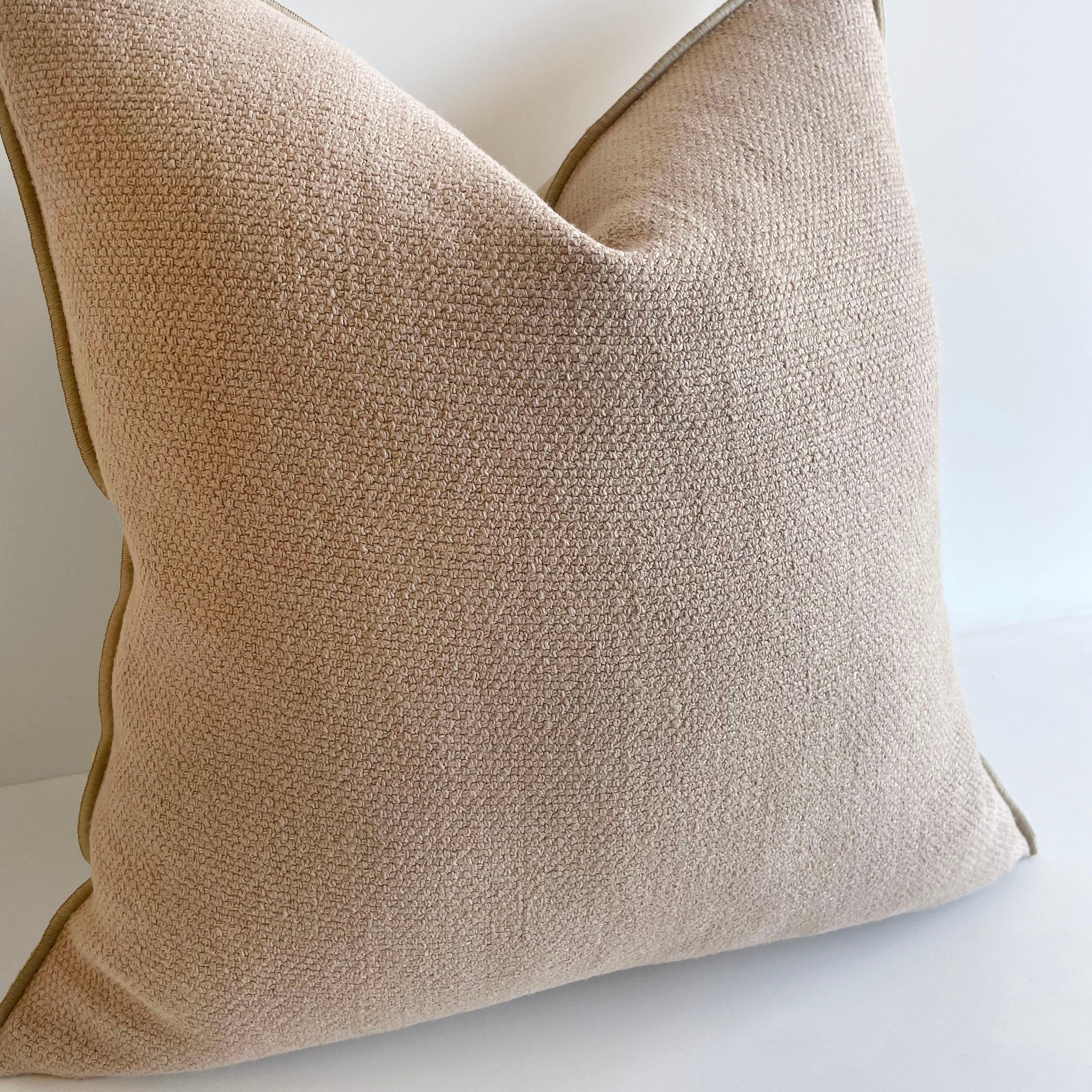 Nude colored linen blend accent pillow. Beautiful nubby soft texture with decorative edge. Metal zipper closure. Includes insert. Limited quantities. Please allow 6-8 weeks for production. 
Color: Nude
Size: 20