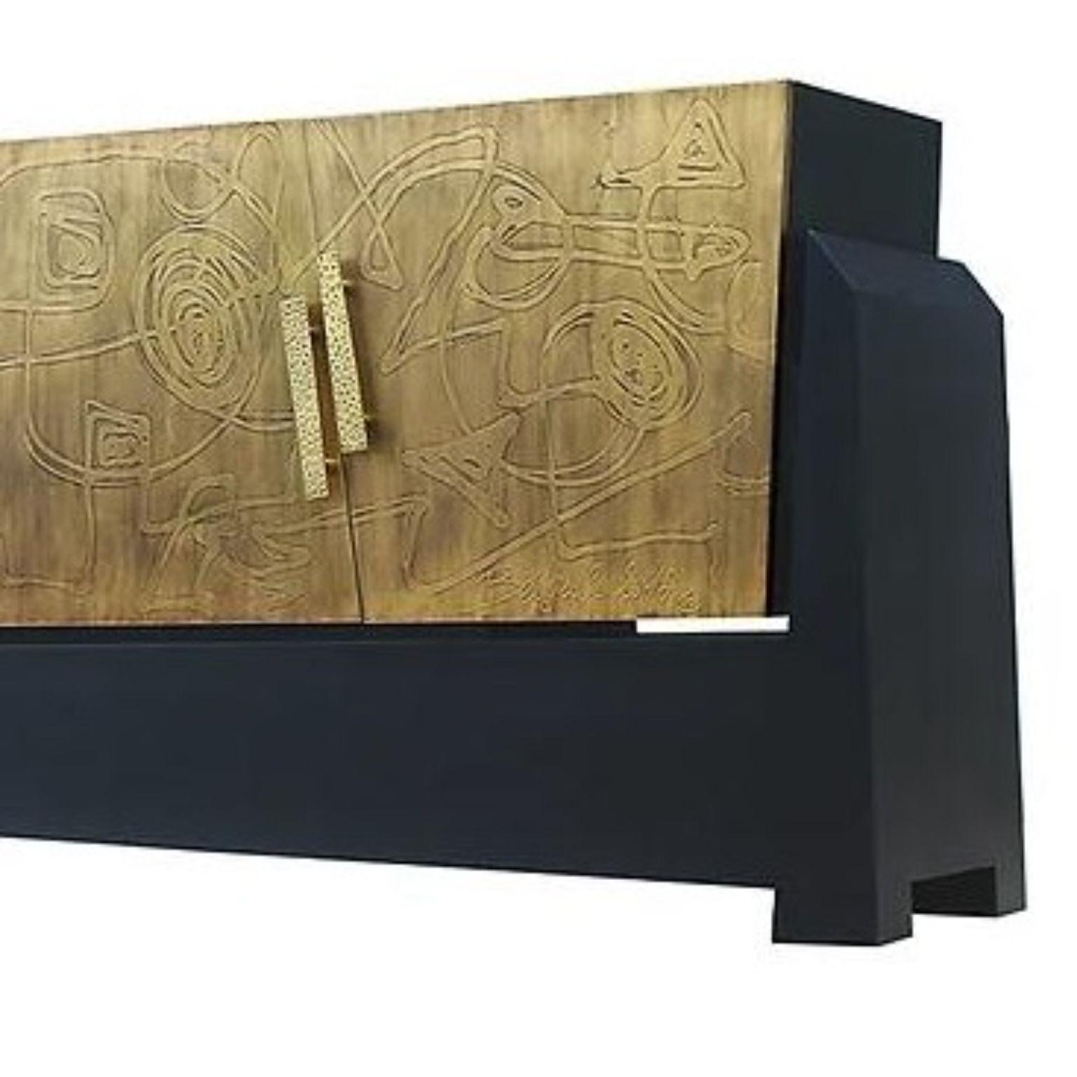 Front Plated in Acid-Etched Brass Trapezium 4D Cabinet by Brutalist Be
One Of A Kind
Dimensions: D 49 x W 207 x H 80 cm.
Materials: Brass and black lacquered wood.

This exclusive sideboard is hand-made of brass and wood, carefully selected and then