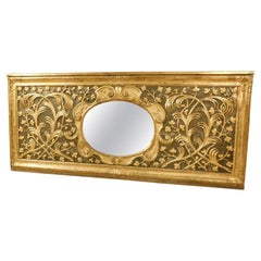 Frontal panel mirror in richly lacquered, carved and gilded wood, Italy