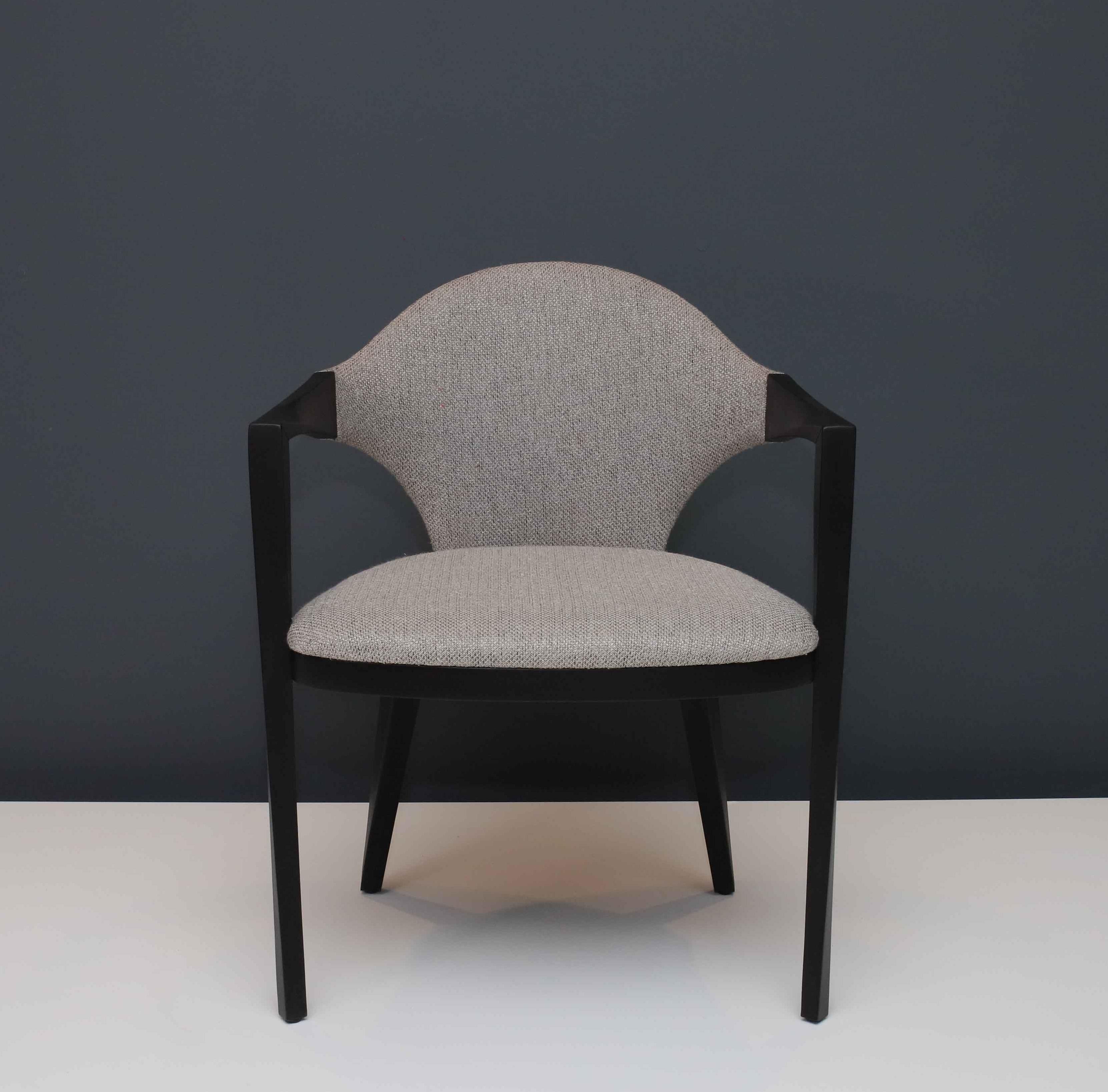 One of the project assumptions for this chair was the intense formal dialogue between different materials like wood and fabric. The designers came to a trace that fluidly and continuously interconnects these two materials.

A piece with strong