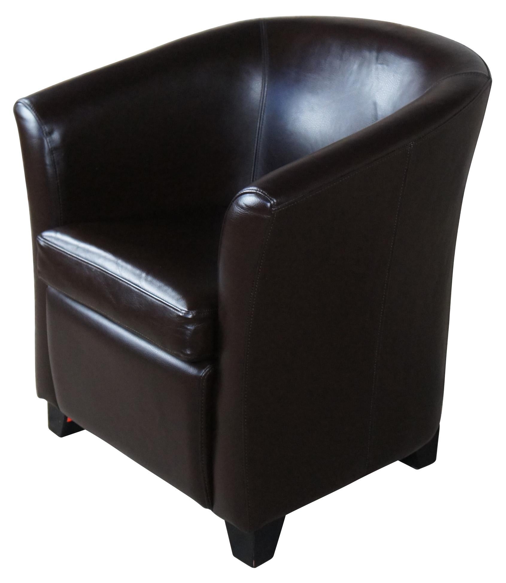 Grandin Road Contemporary barrel back chair has a smooth and sleek look with a curved back leading to flared arms, all covered in an espresso brown leather upholstery. Squared wooden feet add to the contemporary appeal.