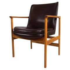 Poltrona Fröscher in pelle di Ib Kofod-Larsen, 1960