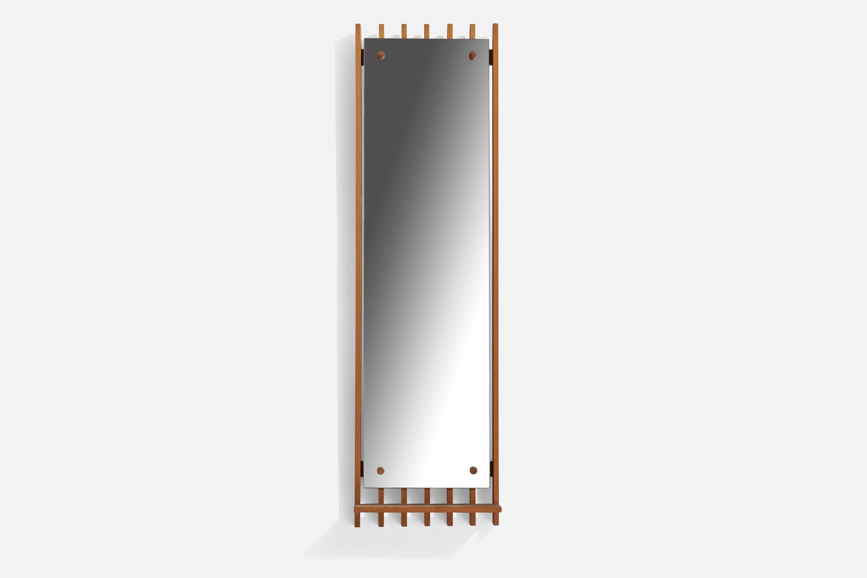 A pine wall mirror designed and produced by Fröseke Nybrofabriken, Sweden, 1970s.