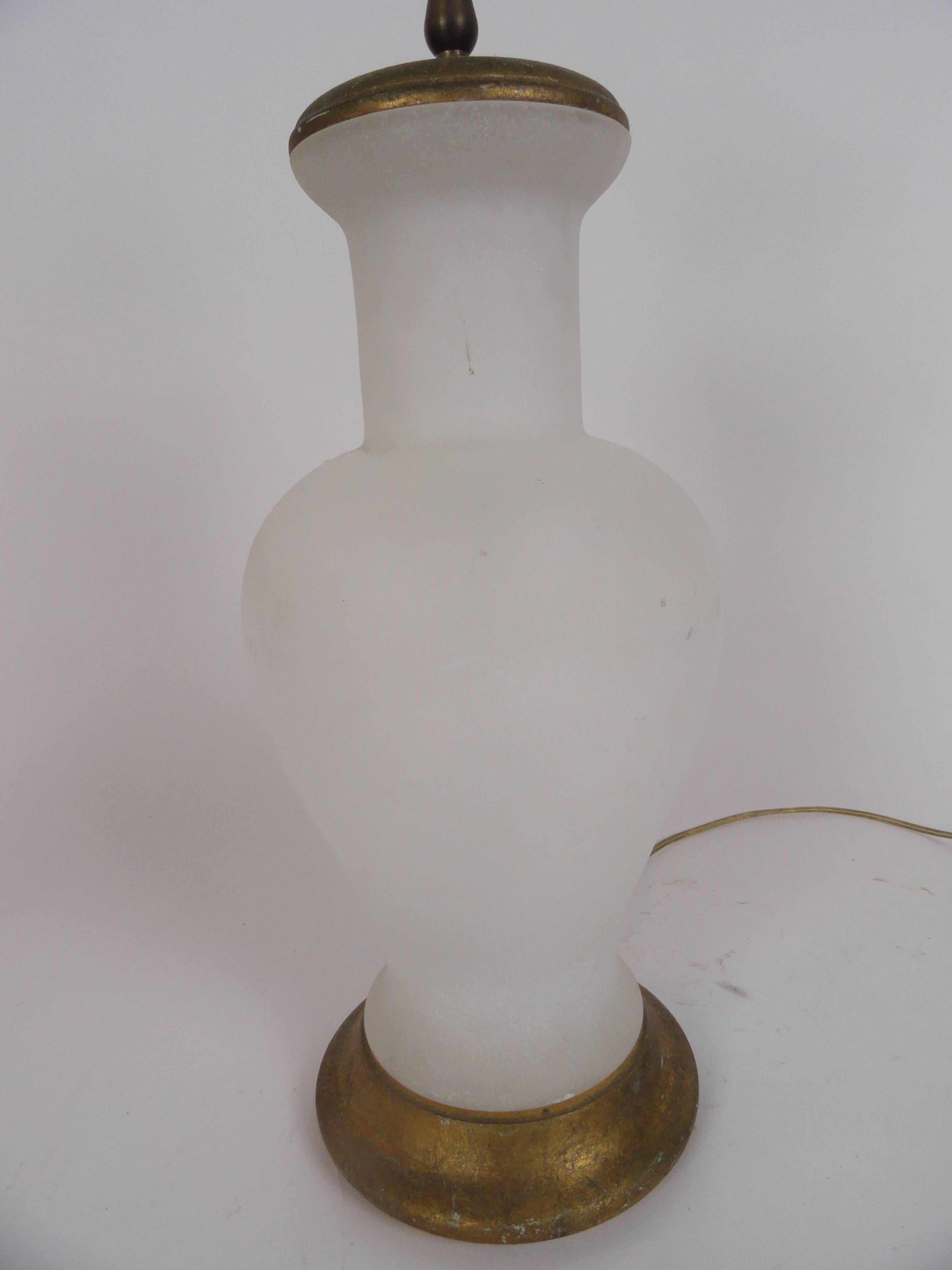 Italian frosted glass lamp from the 1970s. Gold leaf wood base.