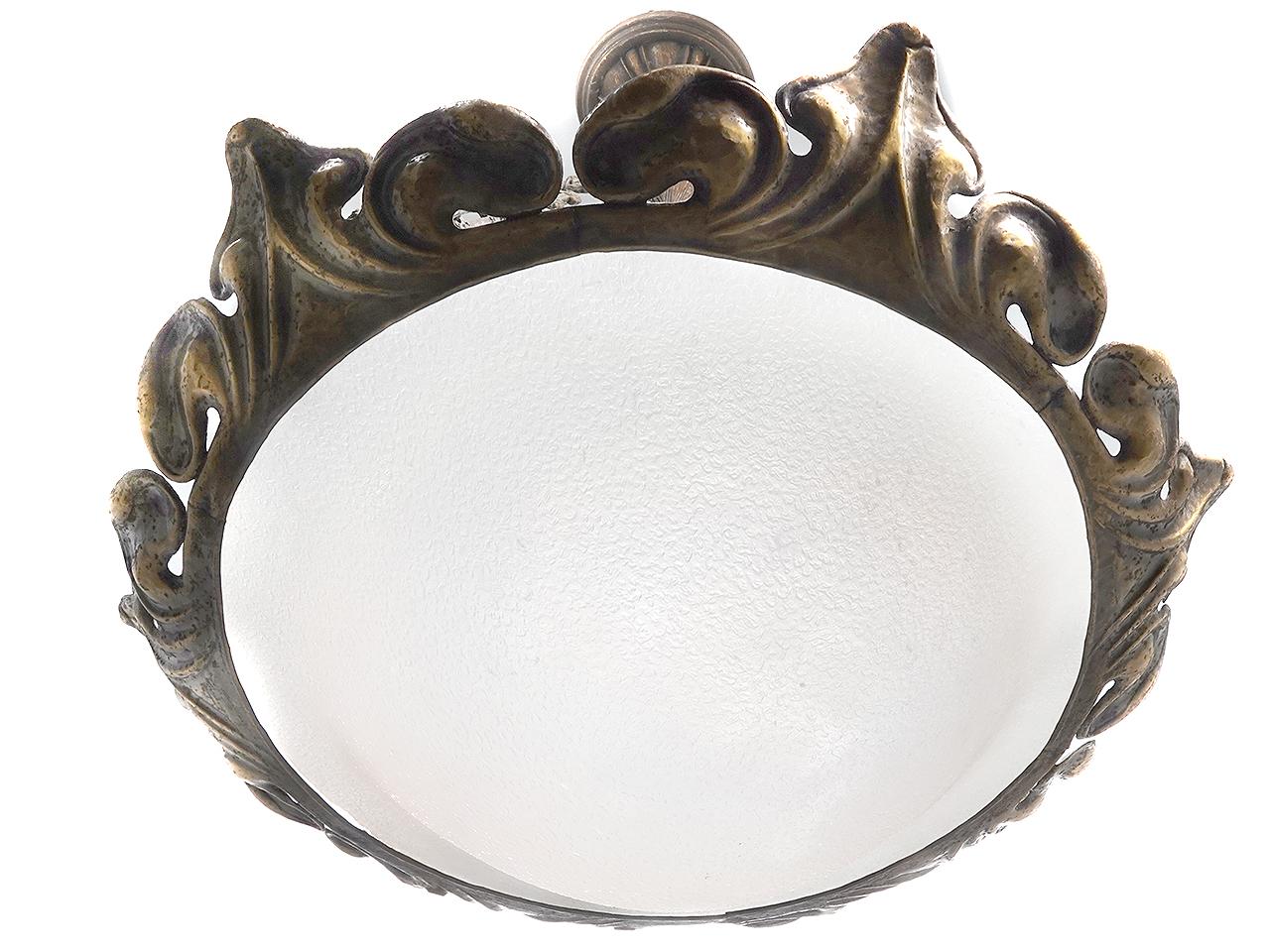 This is an early all original. The sweeping dome shade is frosted and pebbled glass. The decorative floral hand-hammered brass ring is Art Nouveau. The chain and canopy are also original to the lamp as well. We replaced the sockets and wire.