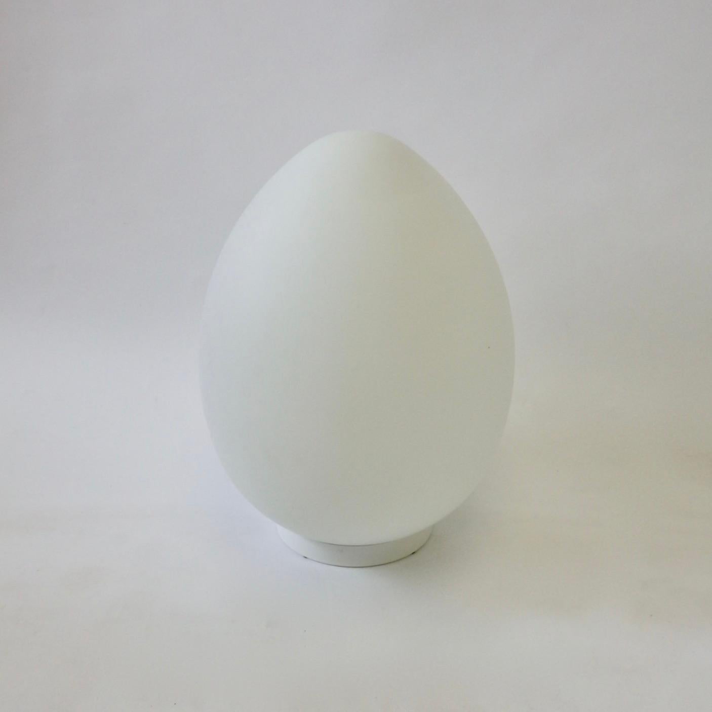tabletop frosted egg shape lamp. Warm glow accent light.