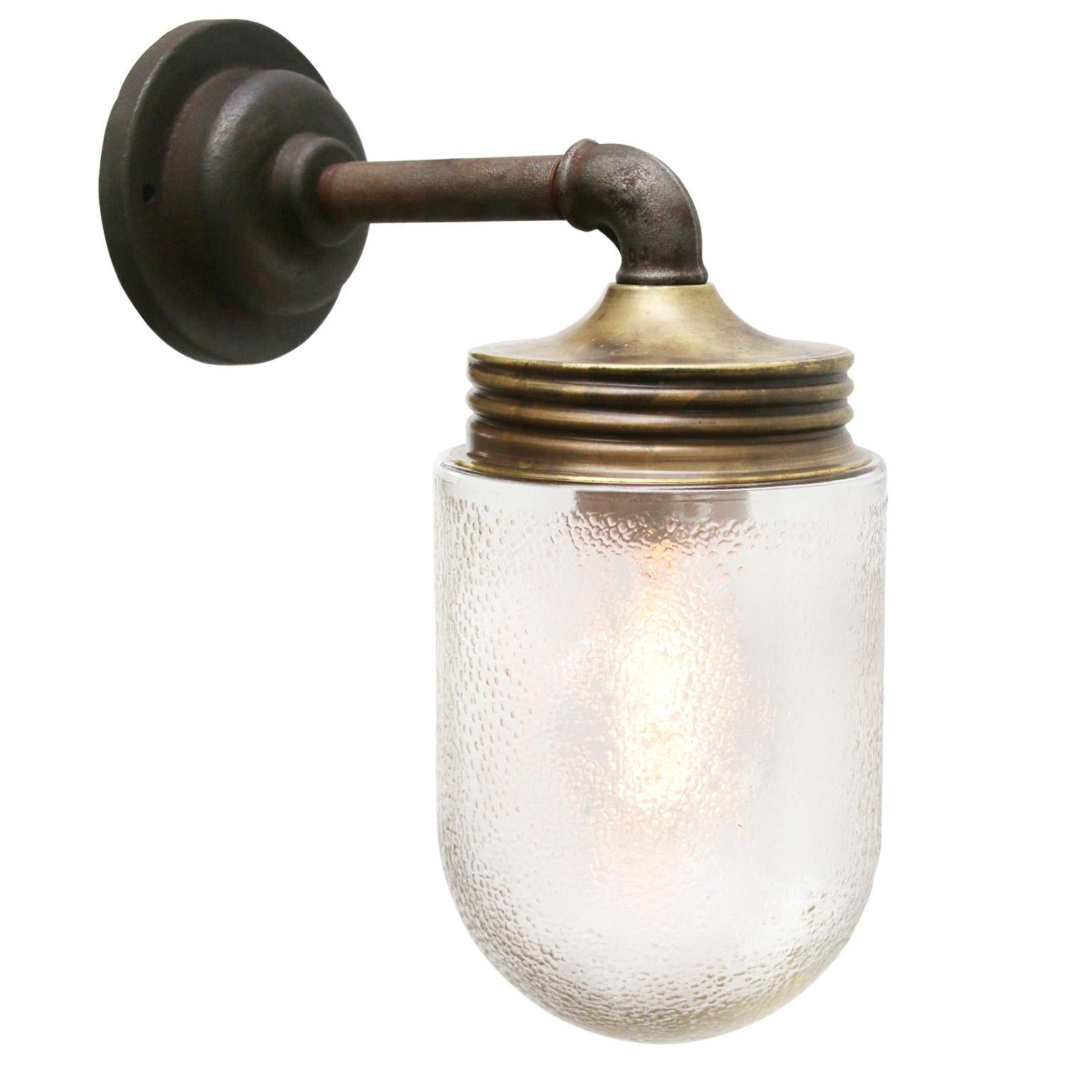 Industrial wall lamp.
Brass and cast iron
Frosted glass.

Diameter cast iron wall piece 10 cm. 2 holes to secure.

Weight: 1.95 kg / 4.3 lb

Priced per individual item. All lamps have been made suitable by international standards for