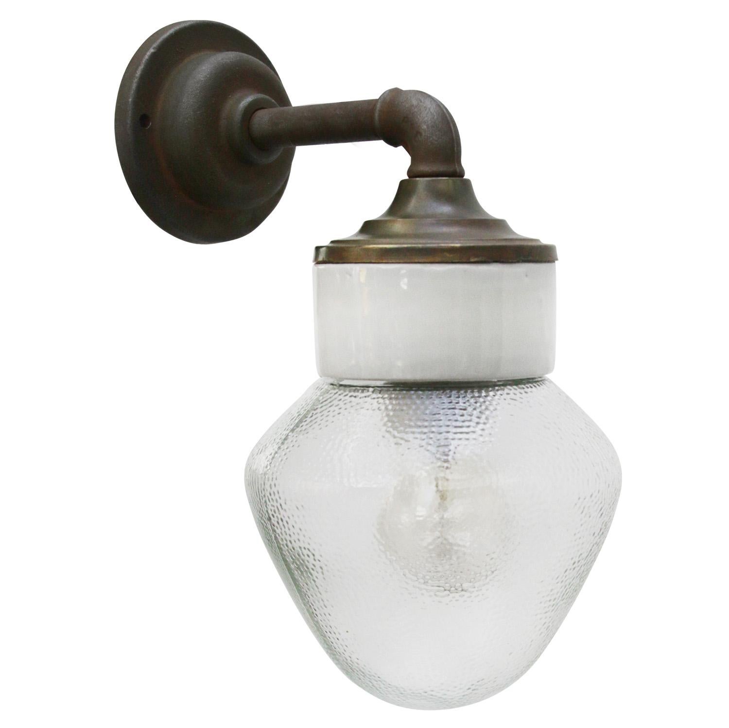 Porcelain Industrial wall lamp.
White porcelain, brass and cast iron
Frosted glass.
2 conductors, no ground.

Diameter wall mount 10.5 cm / 4”.
2 holes to secure.

For use inside only

Weight: 2.20 kg / 4.9 lb

Priced per individual item. All lamps