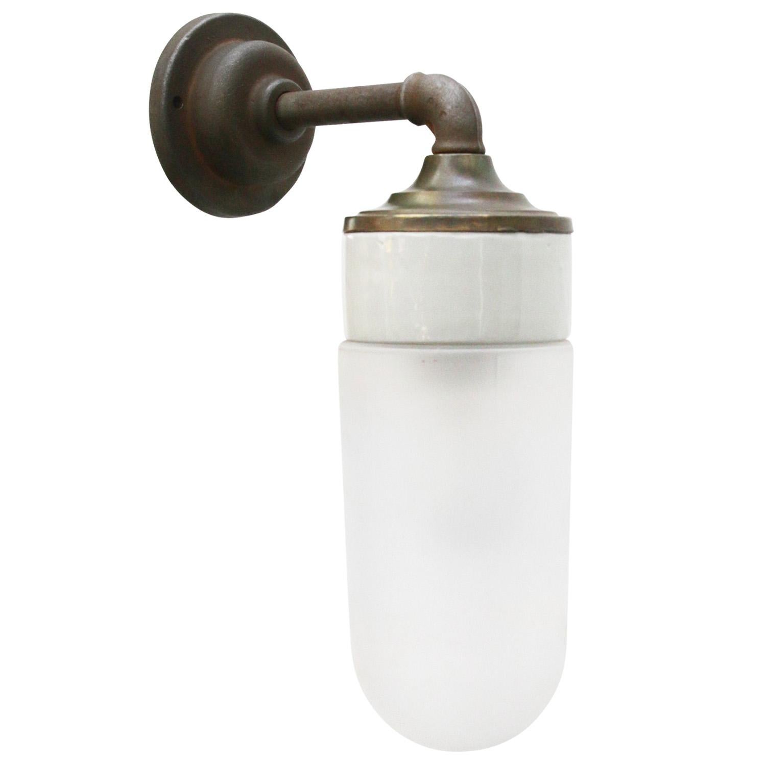 Porcelain Industrial wall lamp.
White porcelain, brass and cast iron
Frosted glass.
2 conductors, no ground.

Diameter wall mount 10.5 cm / 4”.
2 holes to secure.

For use inside only

Weight: 2.10 kg / 4.6 lb

Priced per individual item. All lamps