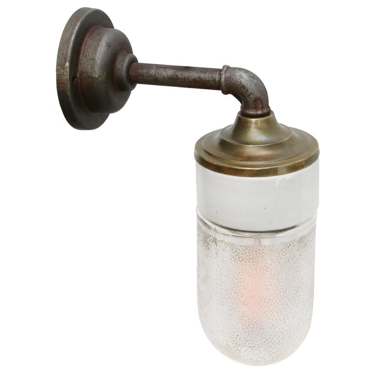 Frosted Glass Brass Vintage Cast Iron Arm Scones Wall Lights In Good Condition For Sale In Amsterdam, NL