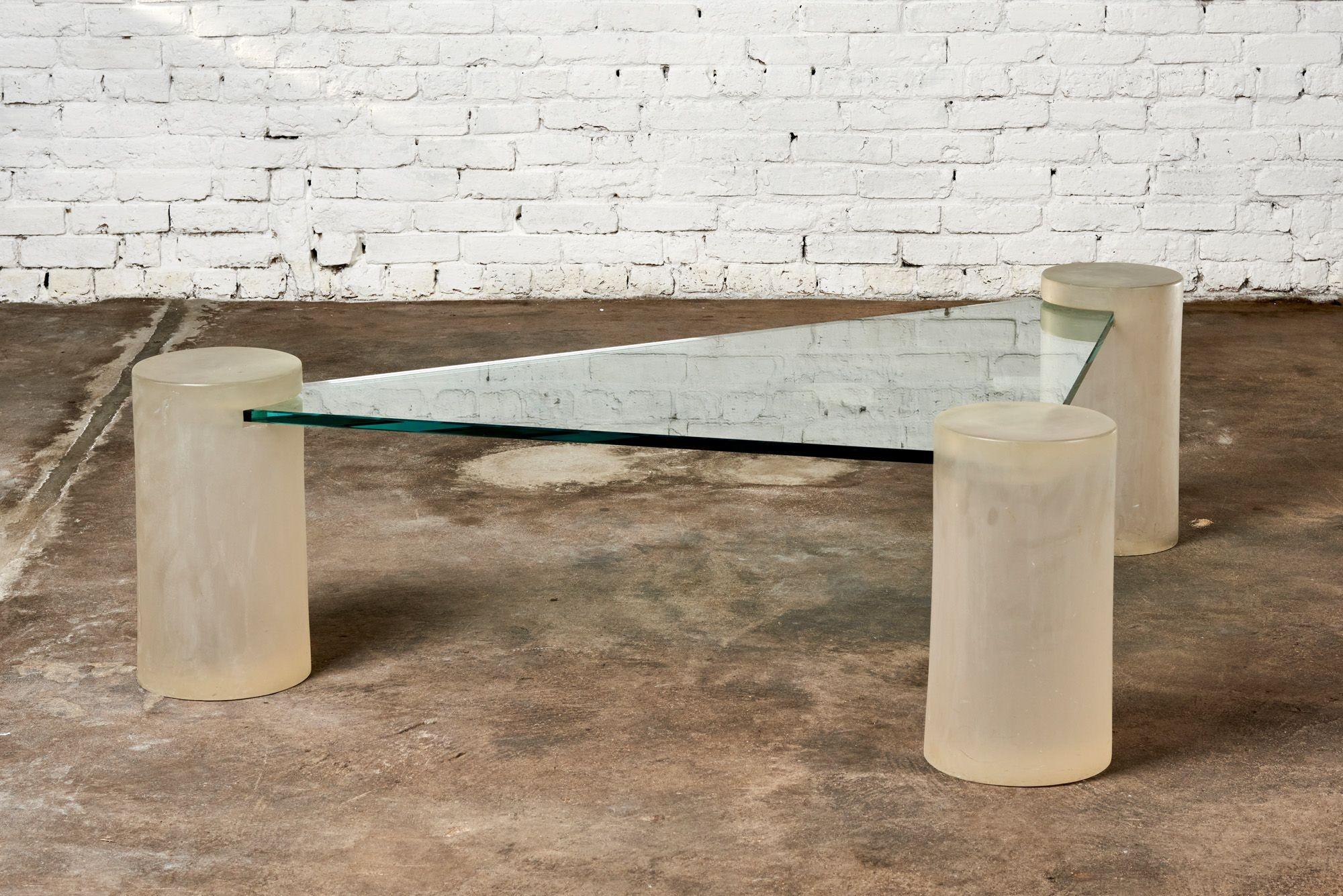Lucite and Glass Triangle Coffee Table, 1980.  Table is in the style of Karl Springer.  Glass top the part that is inserted into the lucite columns have chips on them.  They are not seen on table.