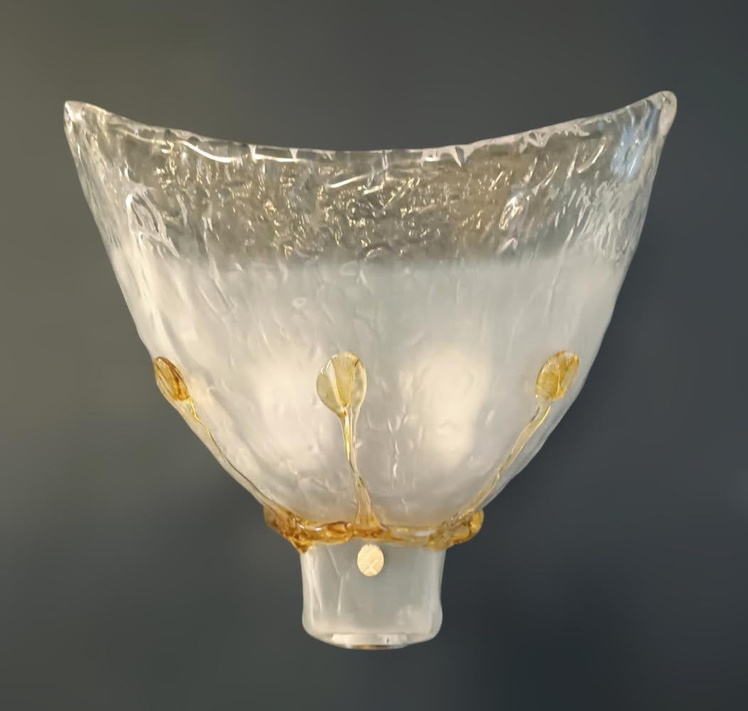 Italian wall light with frosted Murano glass shade decorated with amber details mounted on black metal structure / Made in Italy by Lampe, early 21st Century
Measures: Height 11 inches, width 10 inches, depth 6 inches
2 lights / E26 or E27 type /