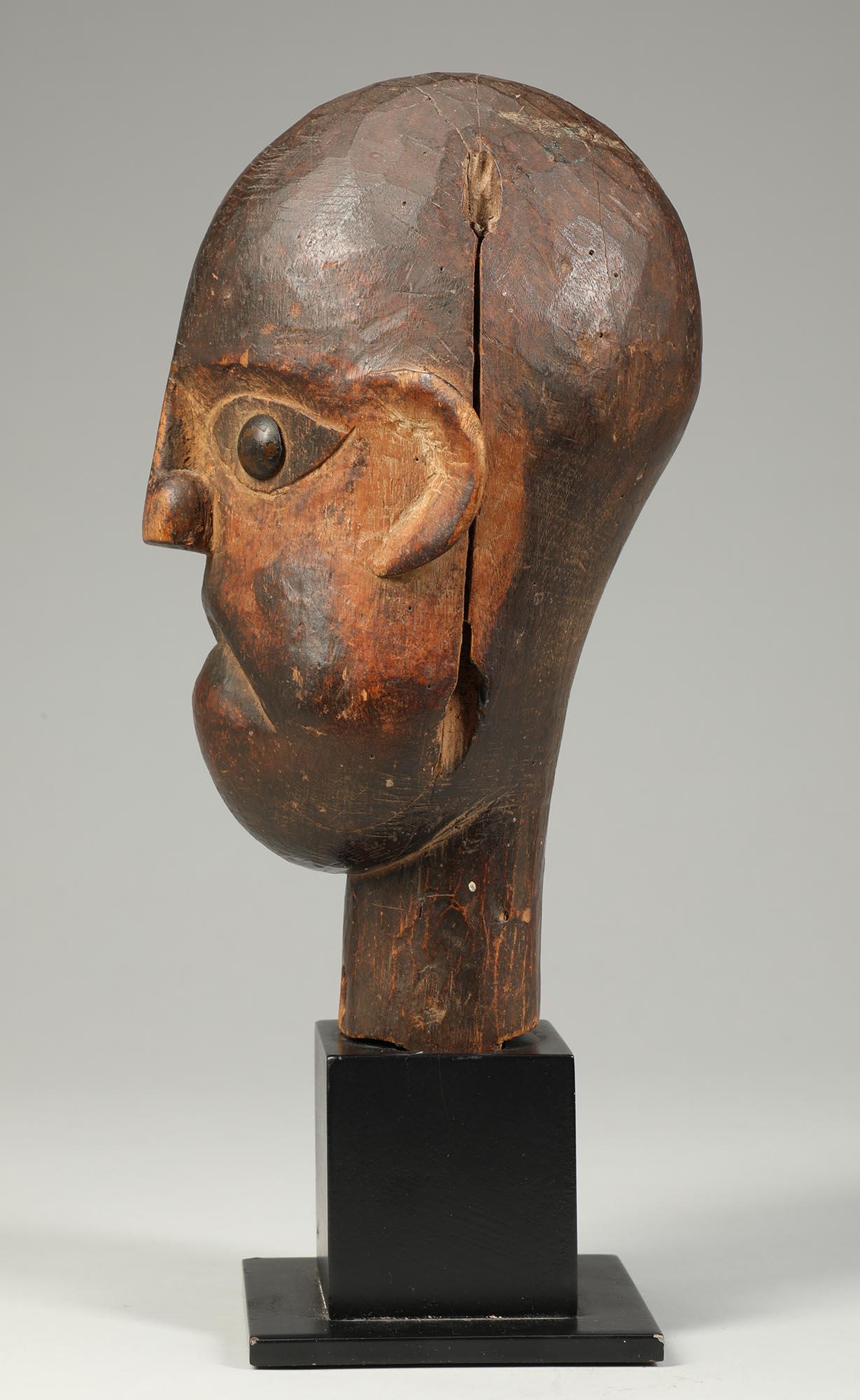 Hand-Carved Cubist Ibibio Puppet Head Brass Eyes Nigeria Early 20th Century stern gaze stand For Sale