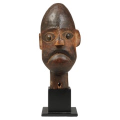 Cubist Ibibio Puppet Head Brass Eyes Nigeria Early 20th Century stern gaze stand