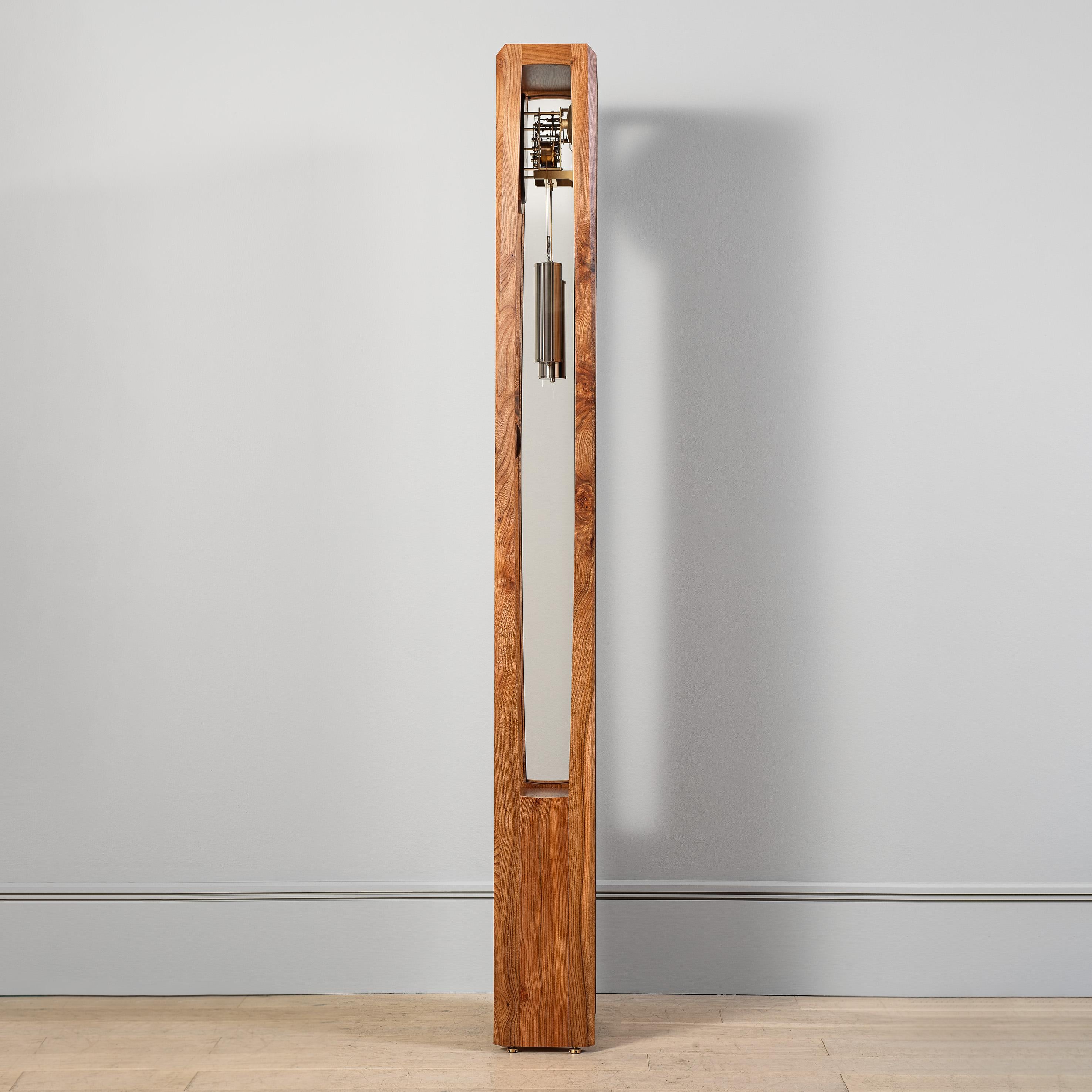 The Froxfield clock in Elm.
A unique limited edition floor clock created by Comitti designer Edmund Barker using selected timbers and contemporary styling. The design is inspired by his time as an apprentice at the renowned Edward Barnsley Workshop