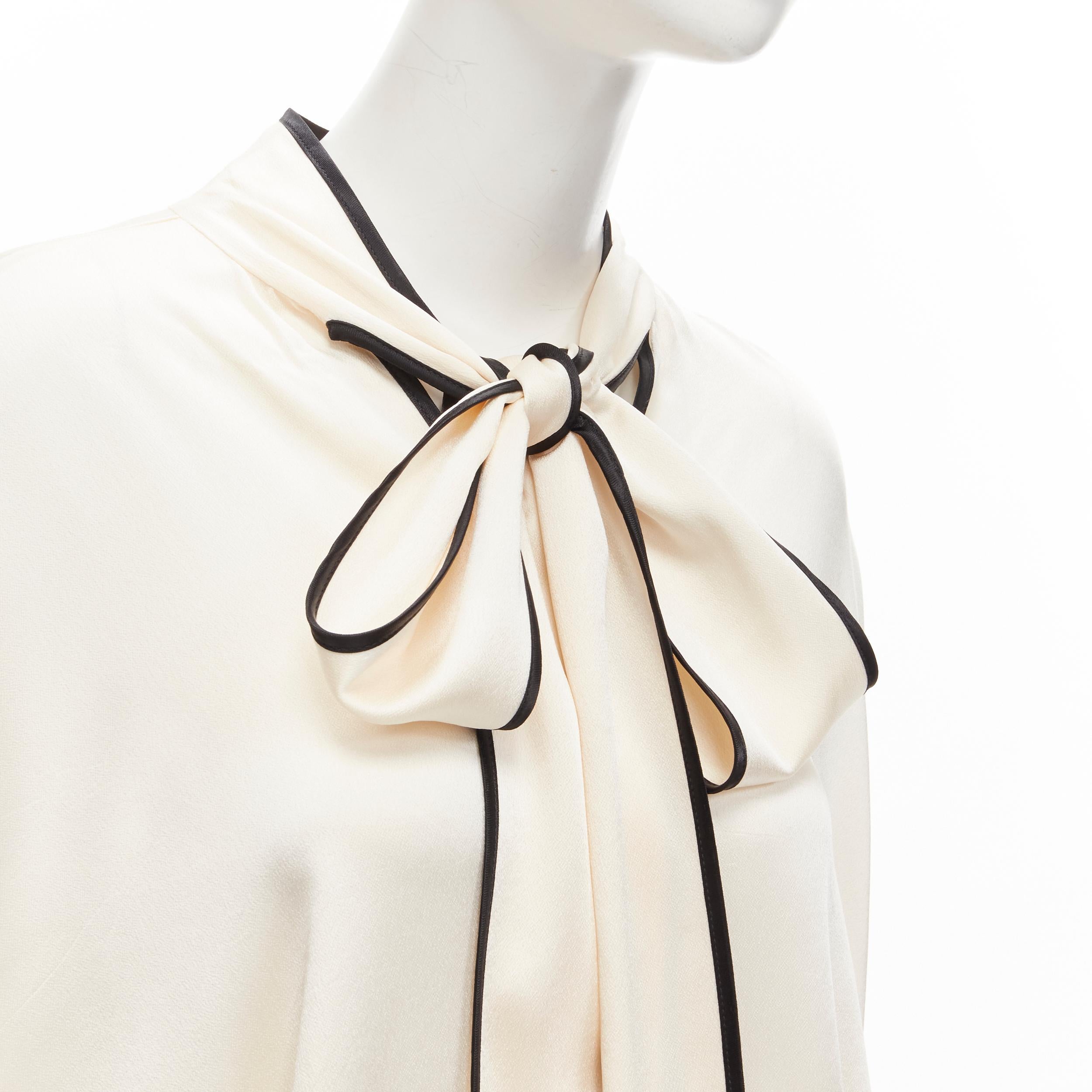 FRS FOR RESTLESS SLEEPERS cream crepe satin bow tie relaxed pajama blouse M
Reference: YNWG/A00124
Brand: For Restless Sleepers
Material: Acetate, Blend
Color: Cream, Black
Pattern: Solid
Closure: Tie Neck
Extra Details: Fabric wrap buttons on