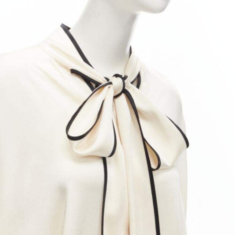 FRS FOR RESTLESS SLEEPERS cream crepe satin bow tie relaxed pajama blouse M
Reference: YNWG/A00124
Brand: For Restless Sleepers
Material: Acetate, Blend
Color: Cream, Black
Pattern: Solid
Closure: Tie Neck
Extra Details: Fabric wrap buttons on