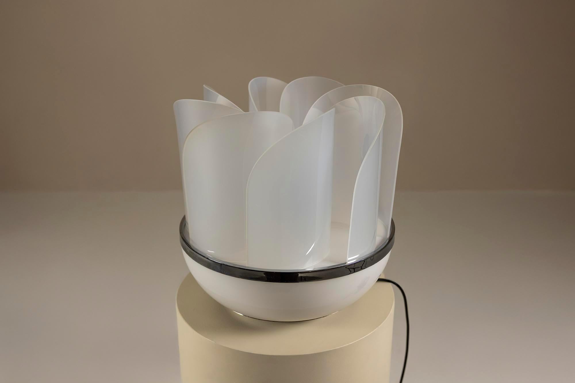 A rare and playful design by Elvio Becheroni from the early 1970s, the table lamp reflects a moment when Italian lighting moved boldly into sculptural territory. Referenced in Luce Lampade 1968–1973: Il Nuovo Design Italiano by Fulvio and Napoleone
