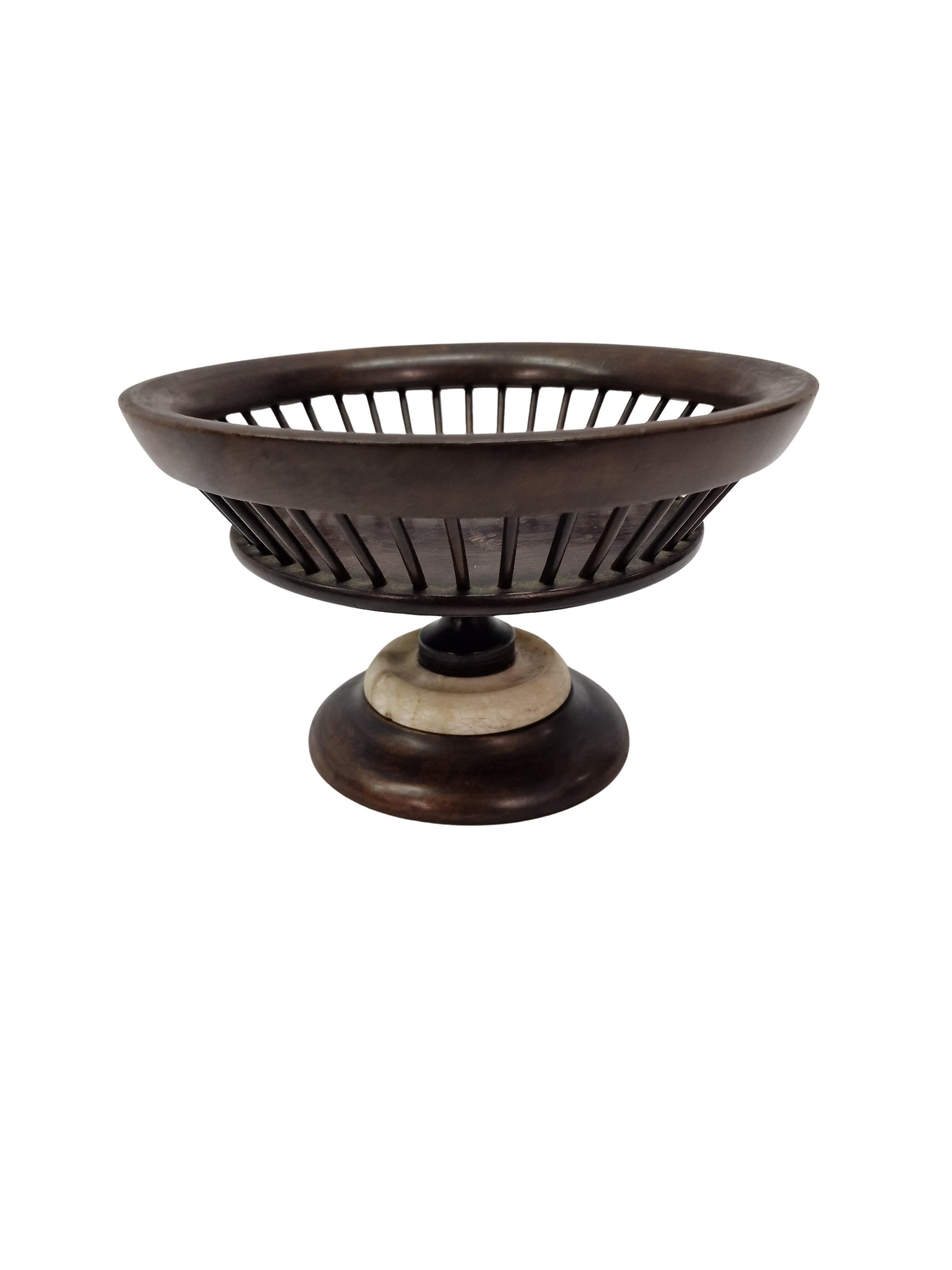 A wonderful table decoration from Italy, made in the end of the 19th century, based on the old models. 

This base is made of cherry wood with a round white alabaster ring at the base. The basket is also made of cherry wood in a round shape and with