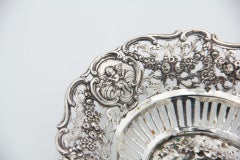 Fruit bowl centerpiece in cut-out silver