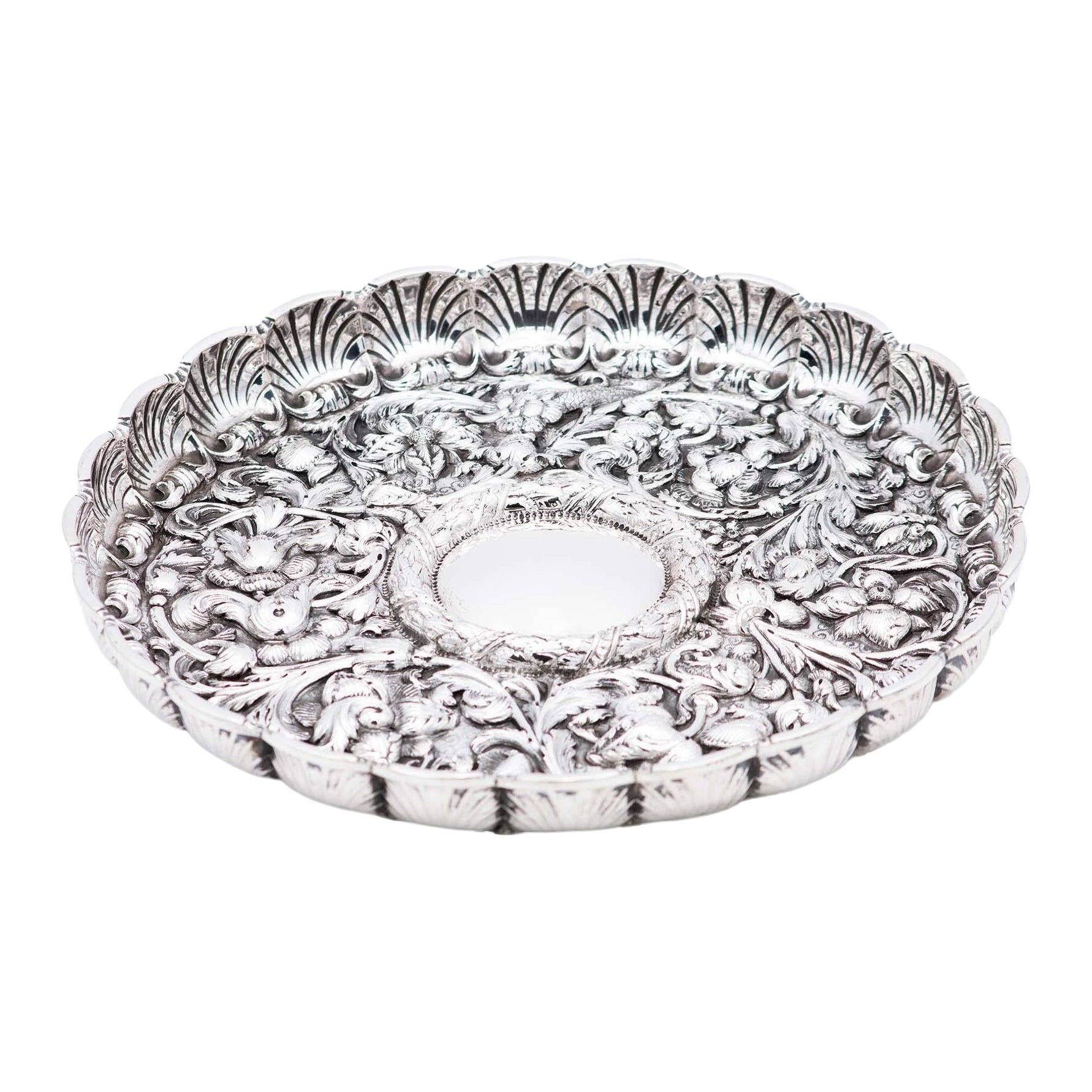Fruit bowl centerpiece in silver profusely embossed with flowers