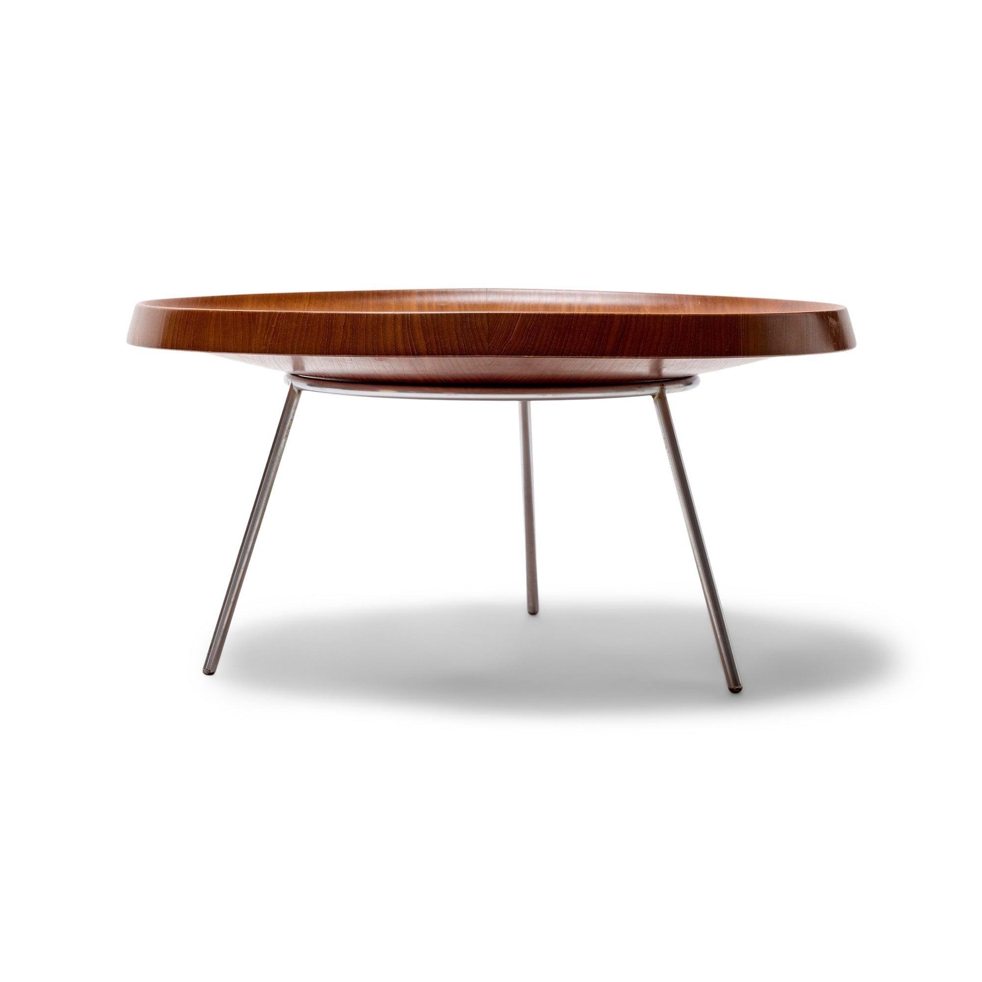 A very rare lathe turned teak fruit bowl on a satin chromed steel three leg stand.
