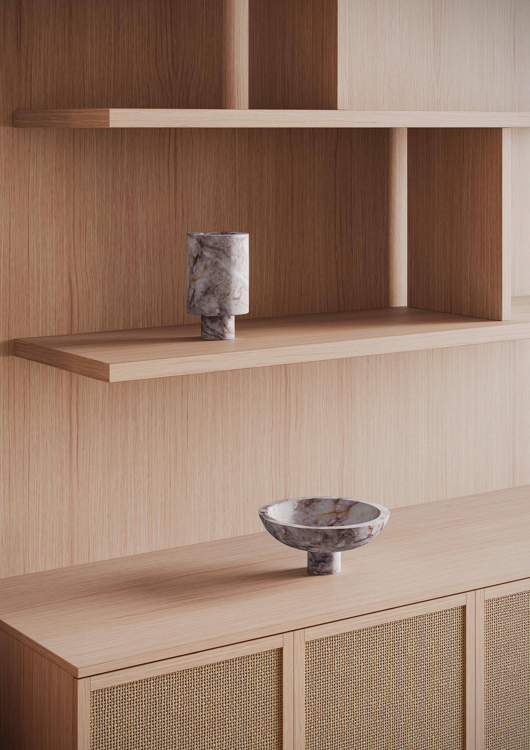 The value of change in a simple act, in stock. Karen Chekerdjian’s new creation puts design front and center: from one foundation, multiple possibilities.
An essential shape and classical lines enhance how, far from being a mere container or going