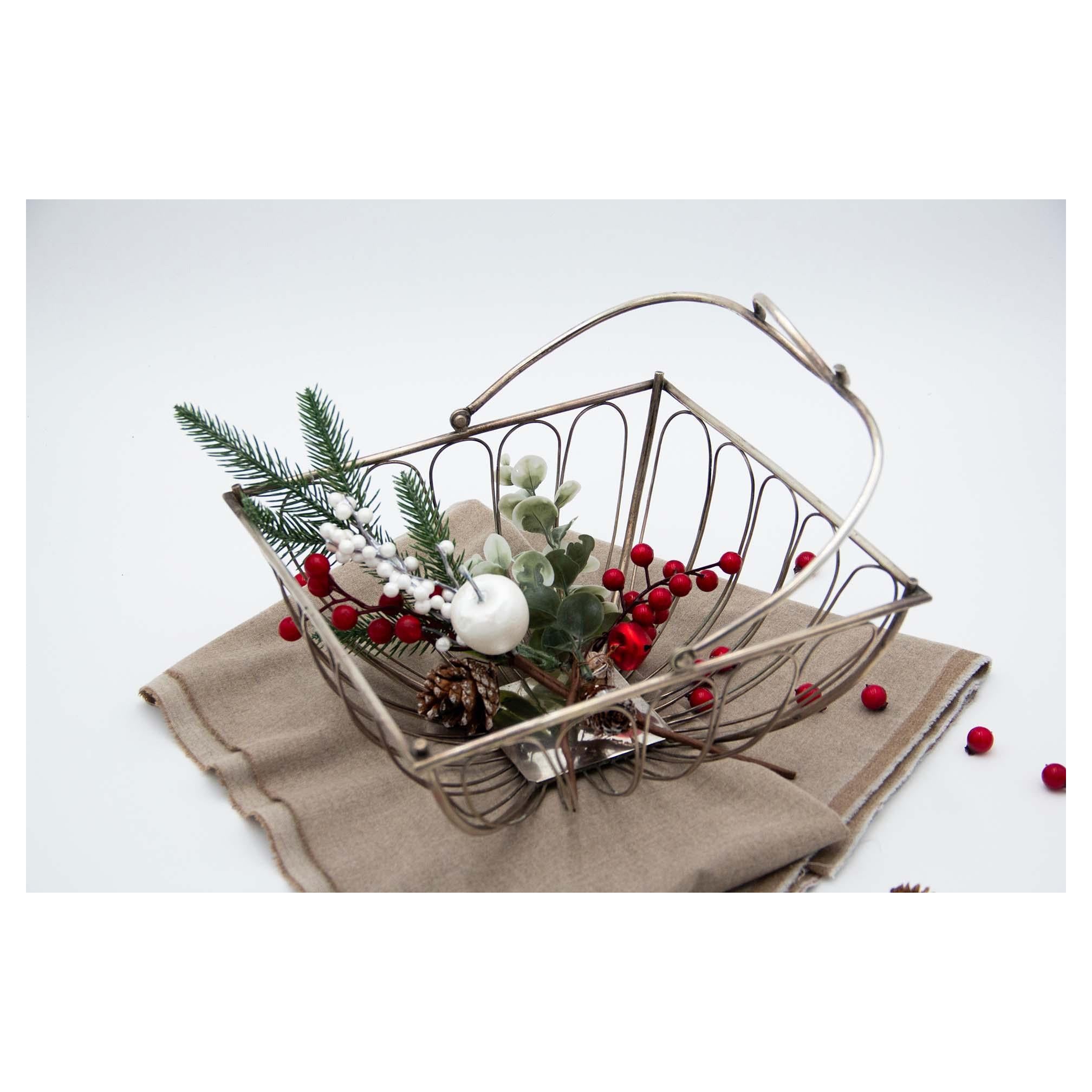 Fruit bowl in silver wire with movable articulated handle