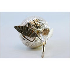 Fruit-shaped silver box with engravings and applications on both sides