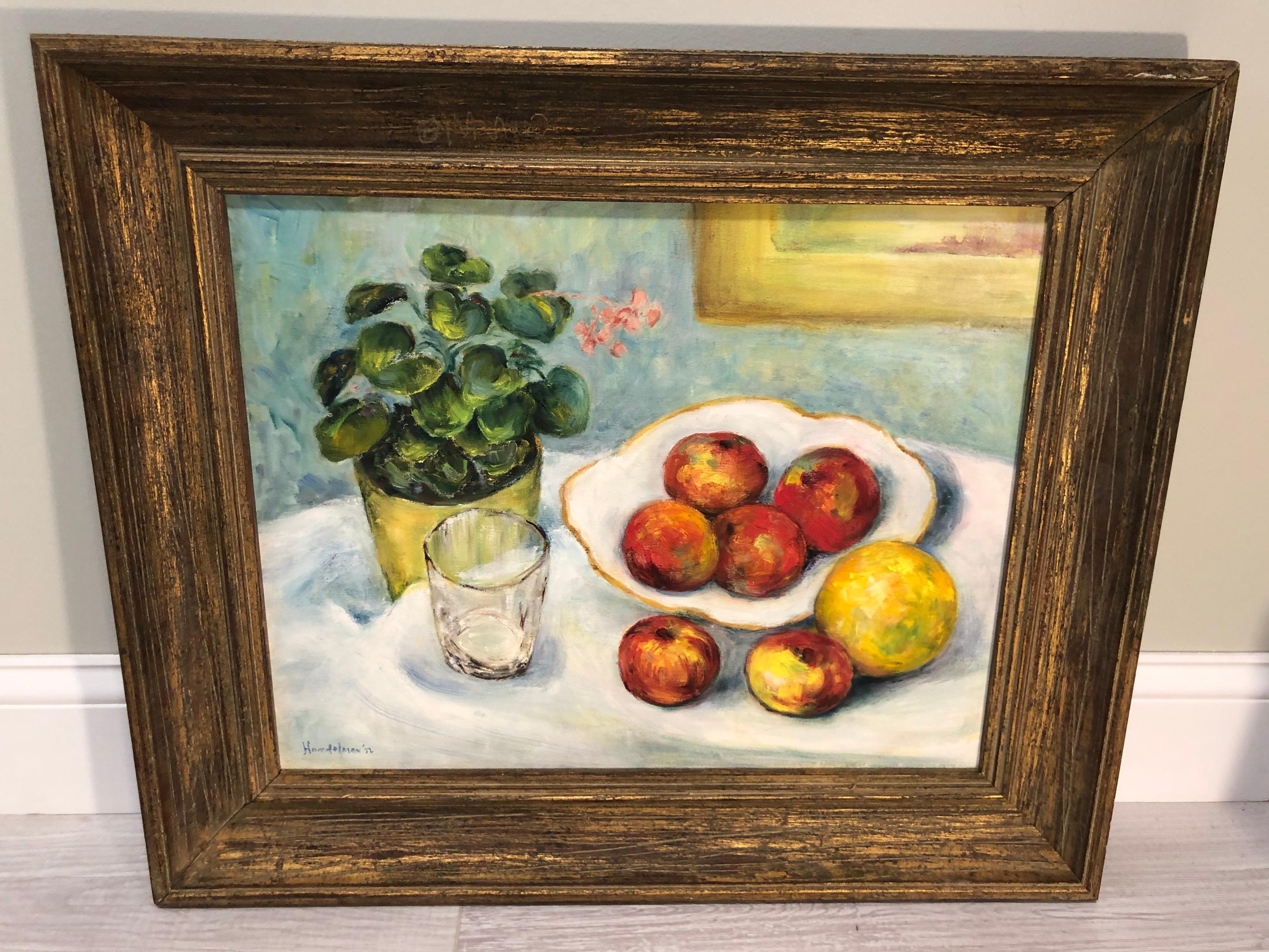 Fruit still life on canvas signed handlemen . Nice composition of fruit on a bowl, a plant and a glass. Simple realistic painting which would look great in a kitchen or diningroom.This can parcel ship domestically for $49.