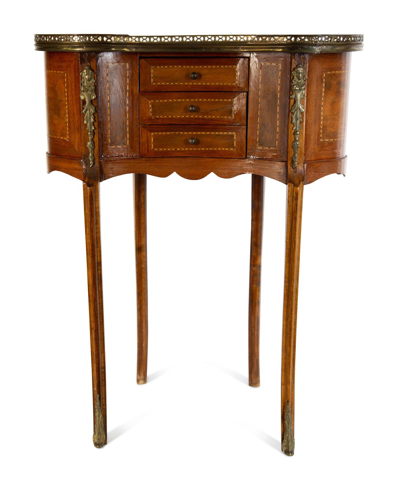 Fruitwood marble top kidney shape side table with three drawers and a brass gallery, late 19th century.
 