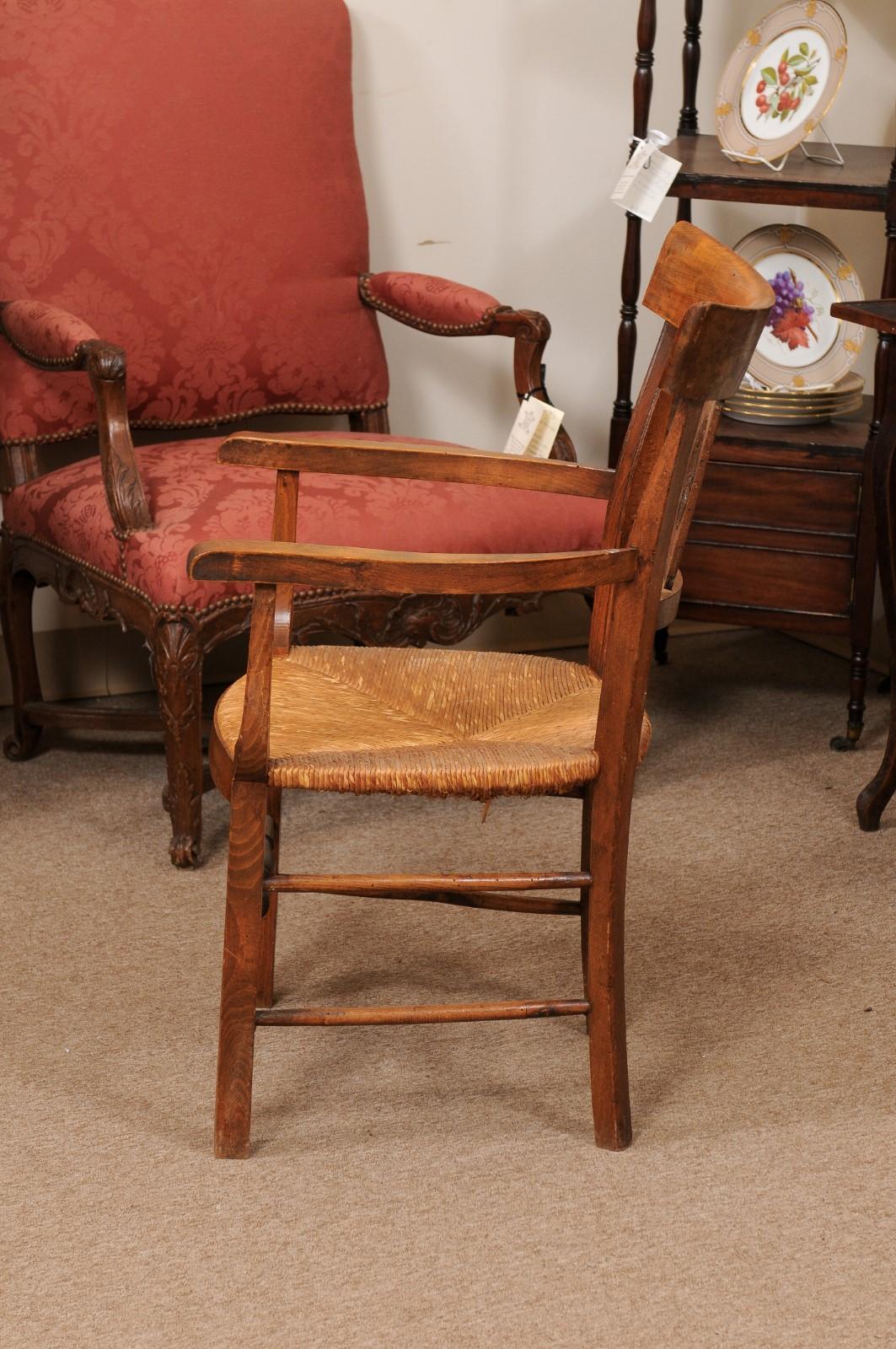 Mid-19th Century Fruitwood Rush Seat Armchair with Flower Basket Backsplat, Italy ca. 1850 For Sale