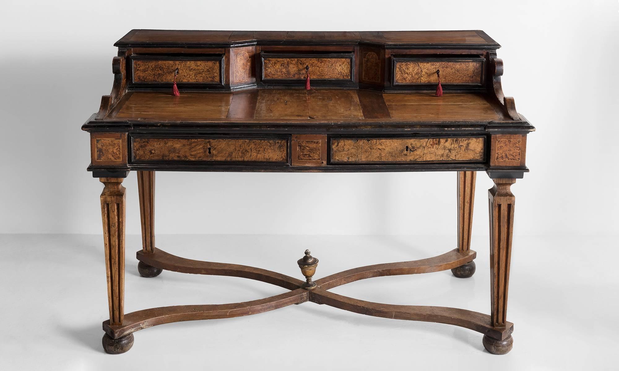Fruitwood Writing Desk, England, circa 1870.

Luxurious fruitwood in various tones with ornate detailing throughout.