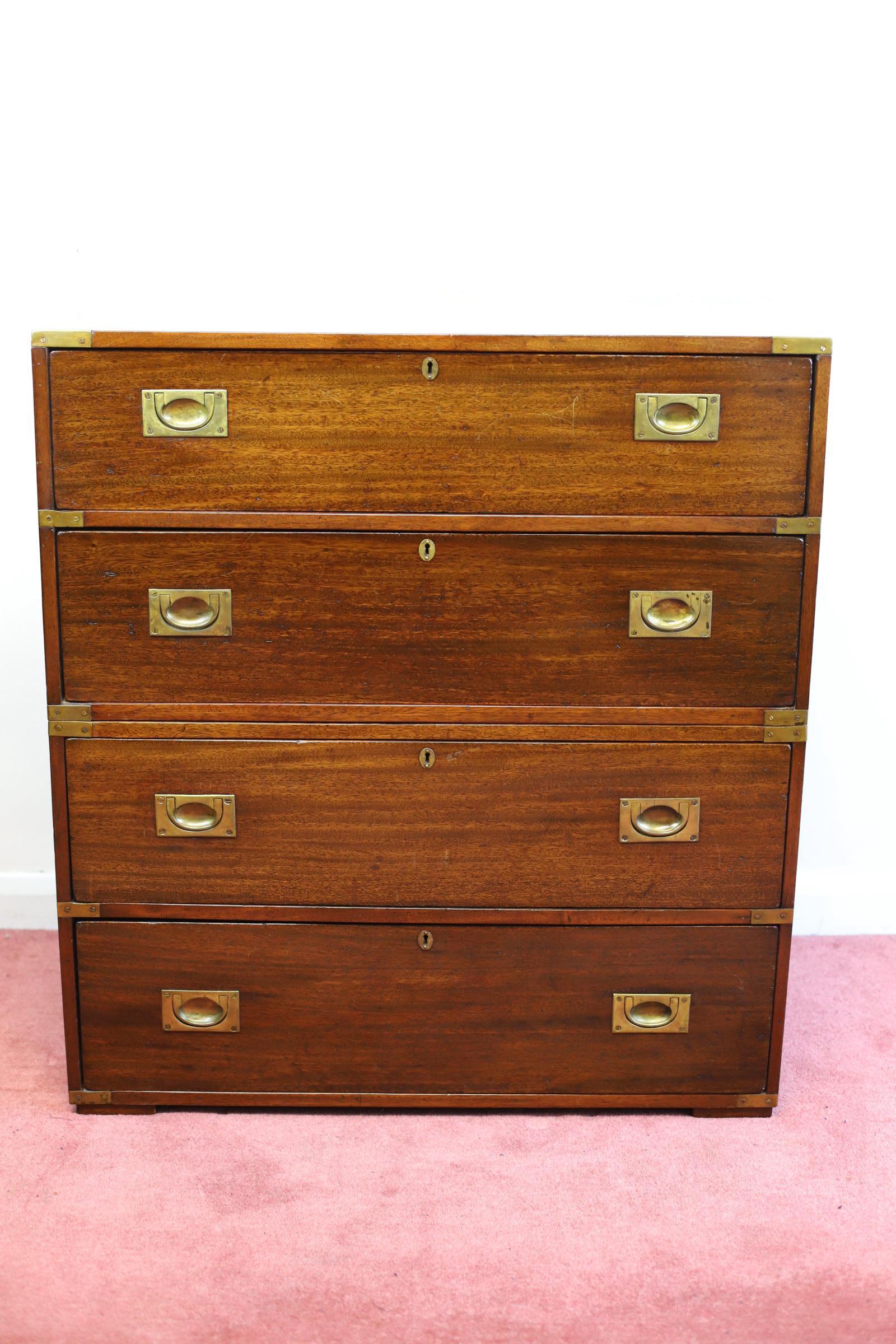 We delight to offer this amazing Military Campaign Chest of Drawers made by Frederick Sage&Company London . It is a great size and is a very useful item. It comes apart in two main pieces, with brass carry handles on the side of each section. There